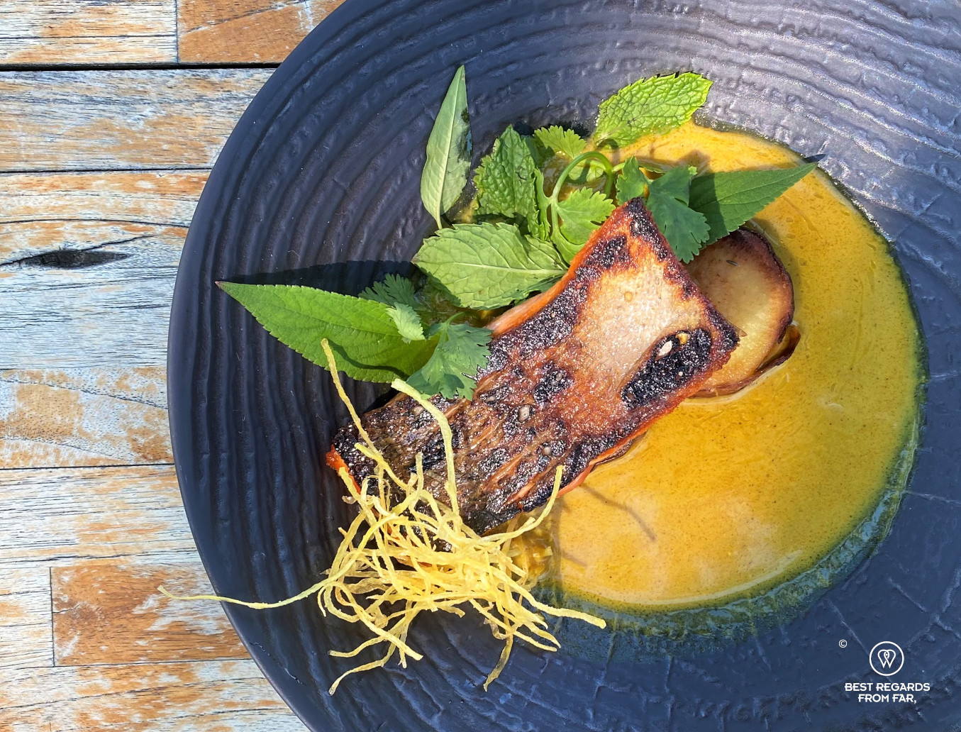 View from the top of the wild trout on a wooden table at the Chefs Warehouse at Maison, Franschhoek