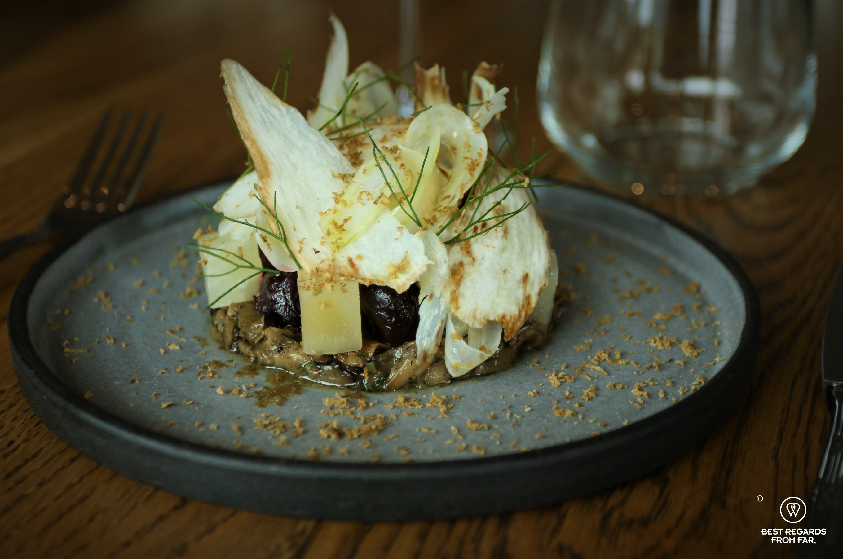 Ceramic plate holding a delicate autumn beetroot, pine ring mushroom ragout and goat cheese custard, the Chefs Warehouse Tintswalo-Atlantic