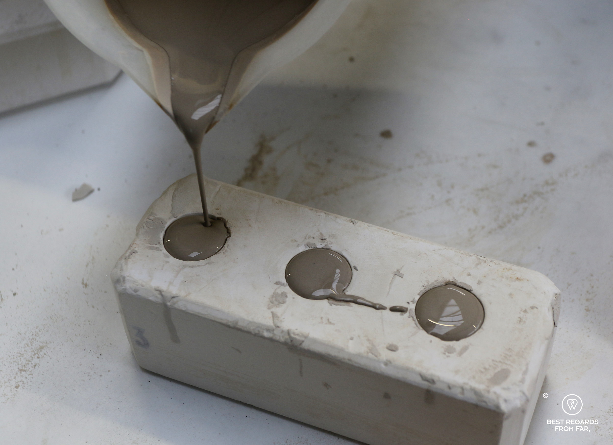Filling the mould, the Royal Delft museum, the Netherlands
