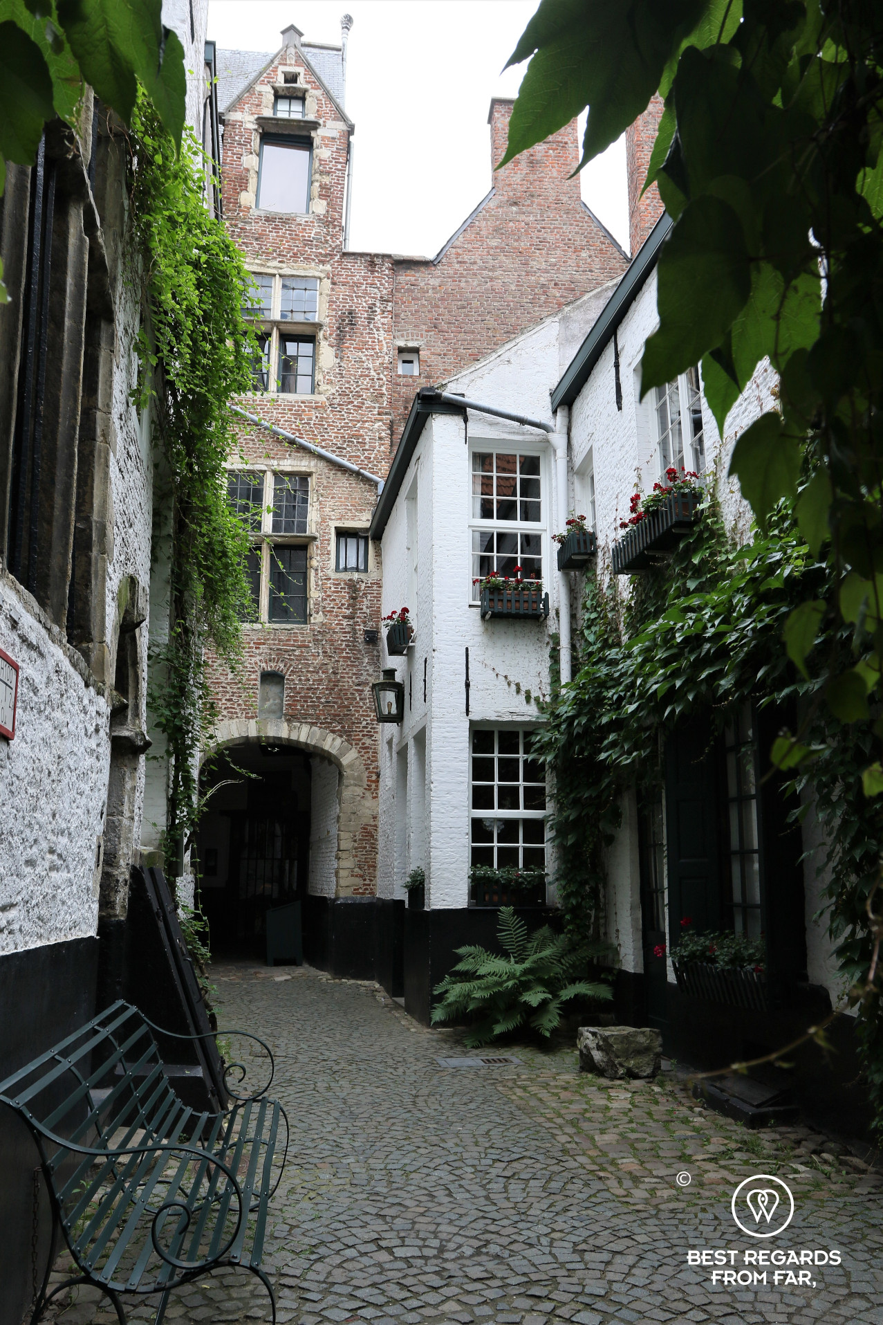 Cute Vlaeykensgang medieval street Antwerp, Belgium