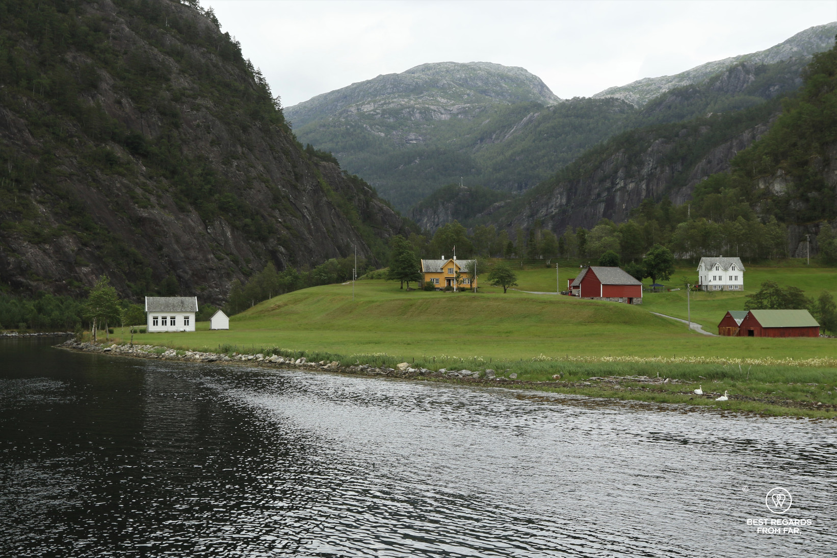 Colourful houses by the fjord during a cruise from Bergen, Norway