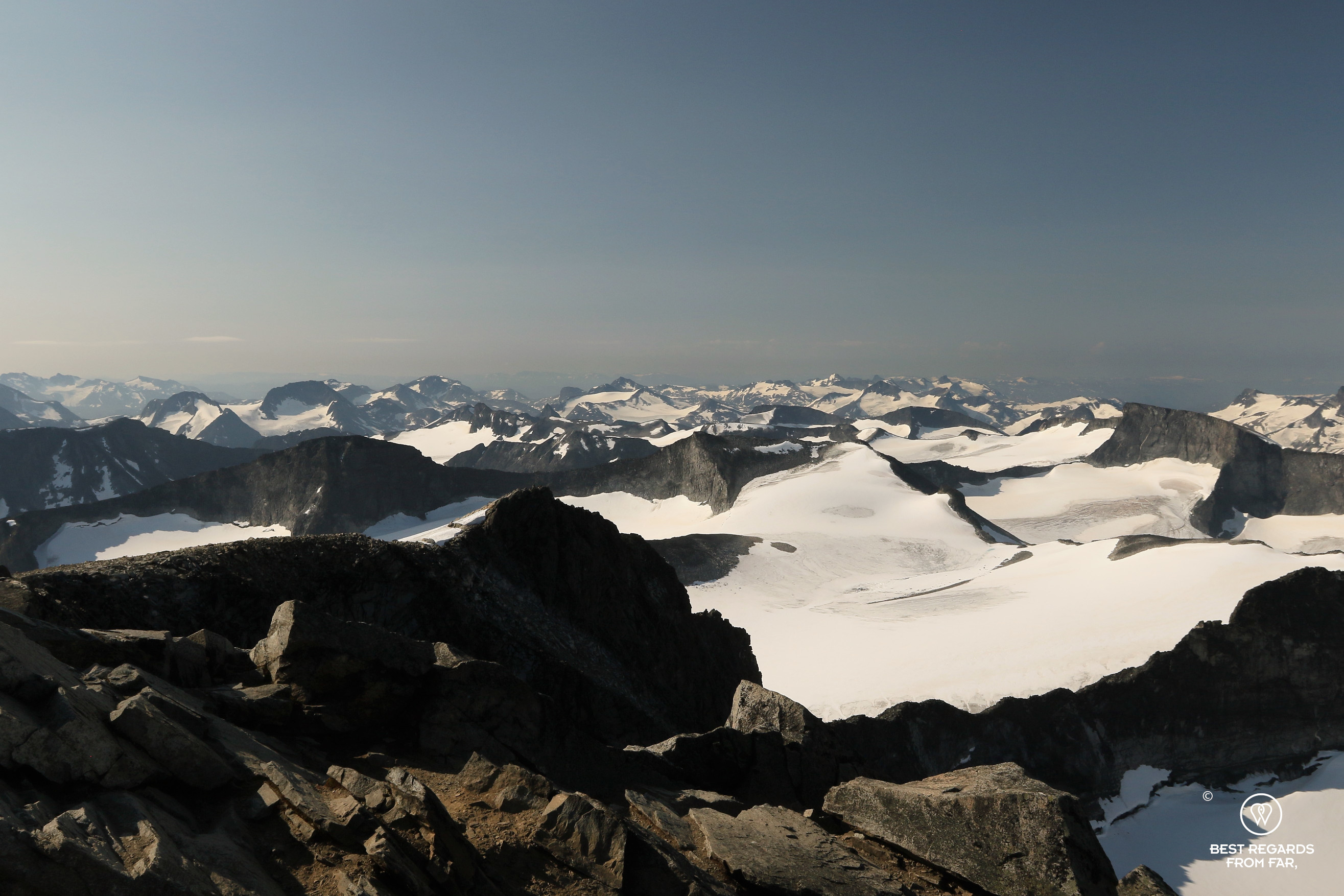 Landscape of snowy peaks seen from Galdhøpiggen, Norway's highest