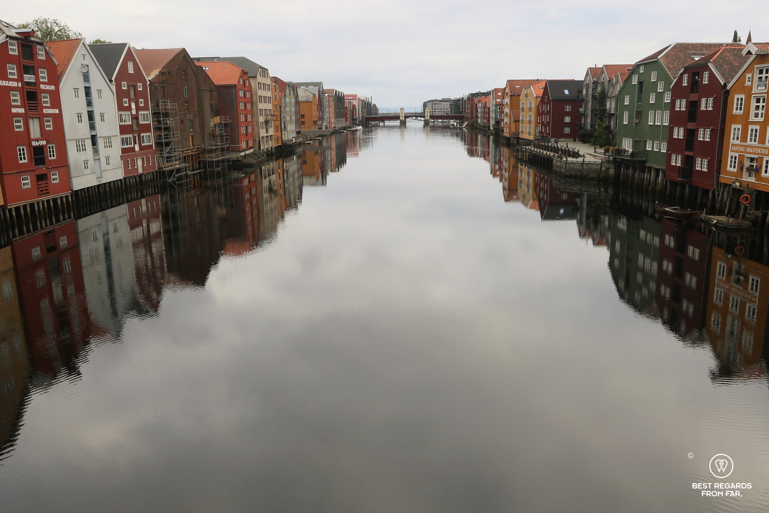 Bryggen in Trondheim reflecting in the river, Norway