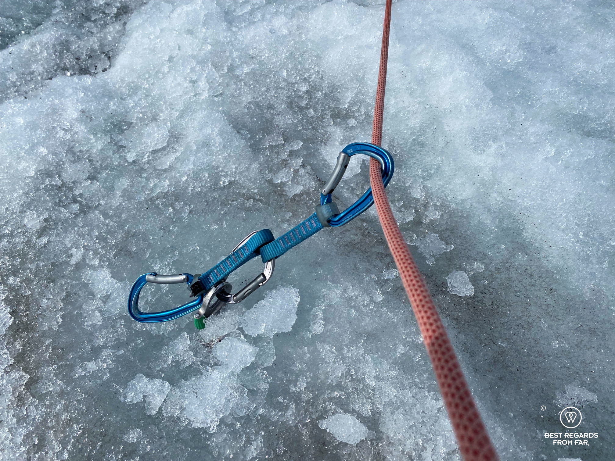Rope secured in the glacier by an ice screw