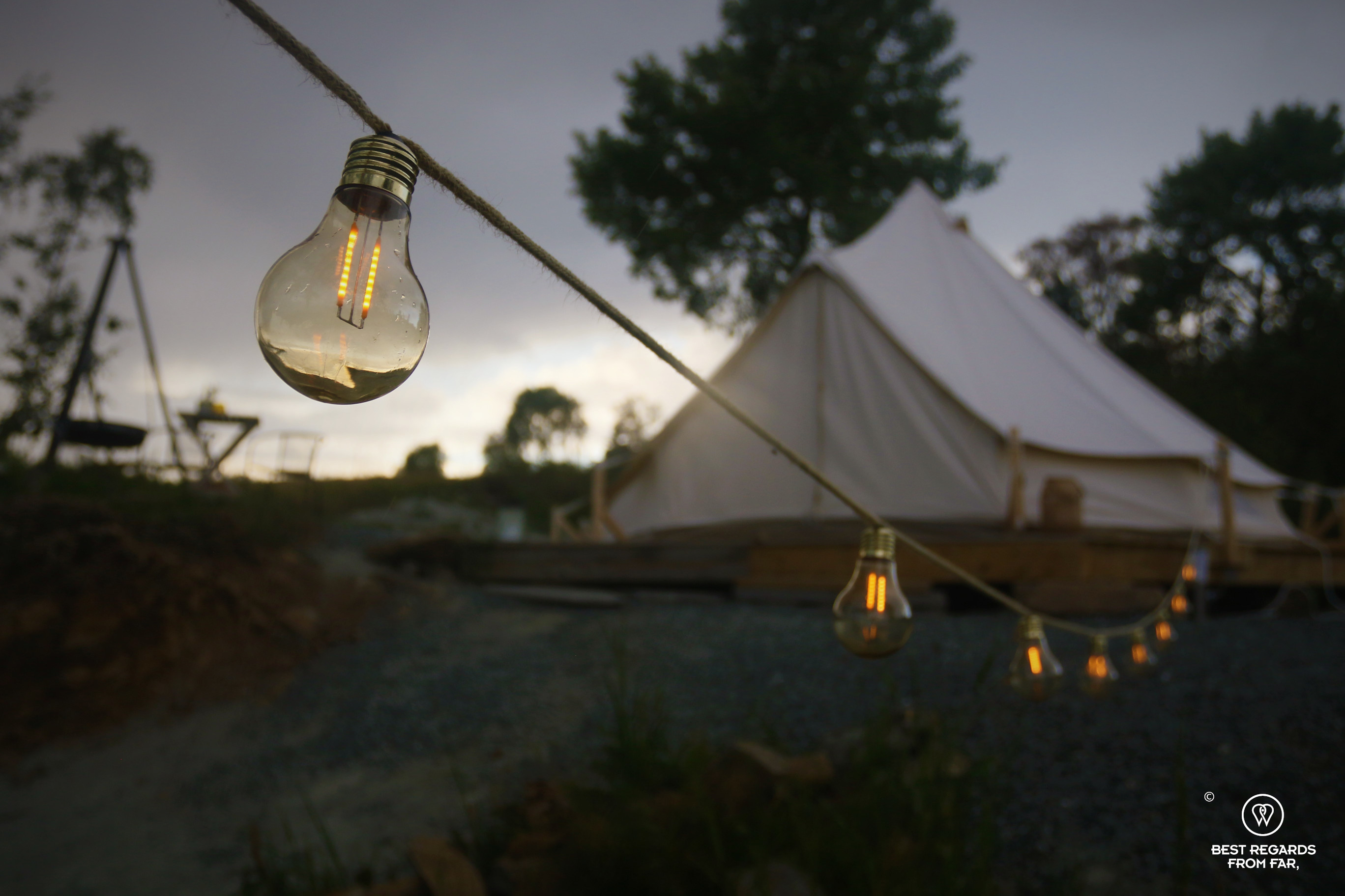 Glamping tent at dusk at Husfrua farm hotel, Norway