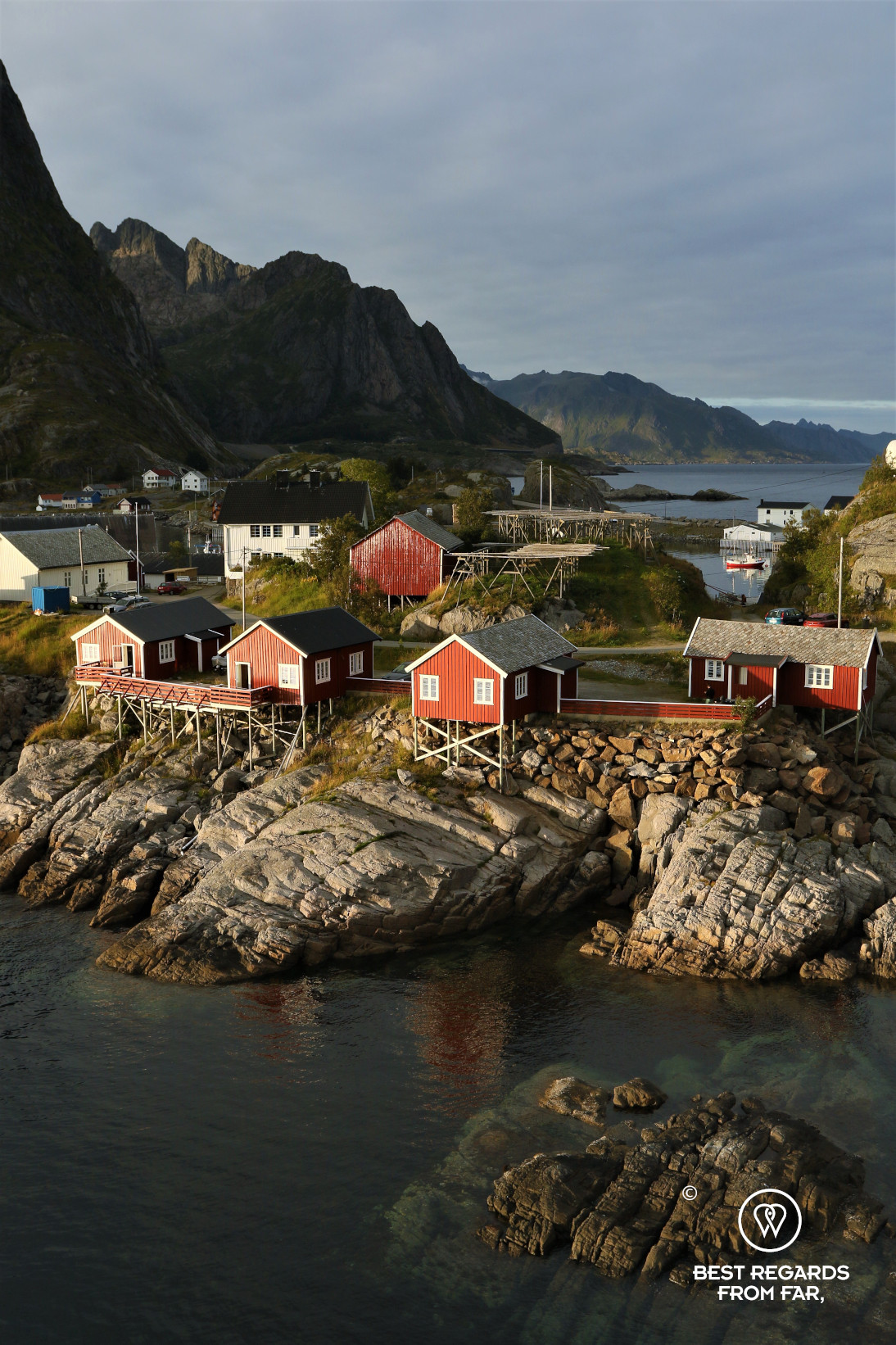 Red rorbuer over the water at Eliassen hotel, Hamnøya, Lofoten, Norway