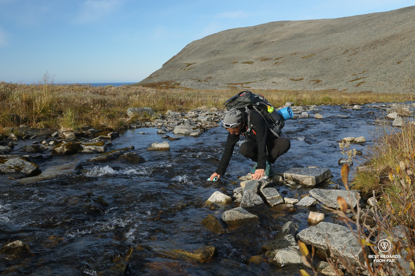 Taking water in a stream on the hike to Kinnarodden, Cape Nordkinn