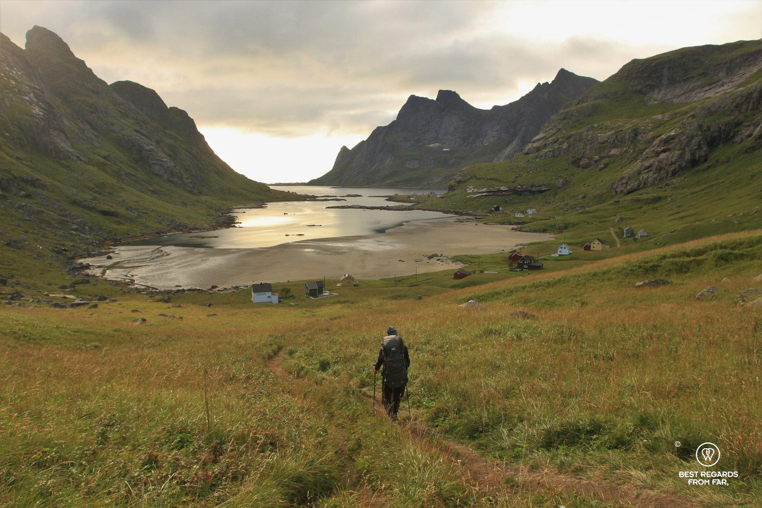 Hiker going to Bunes Beach in Lofoten, Norway
