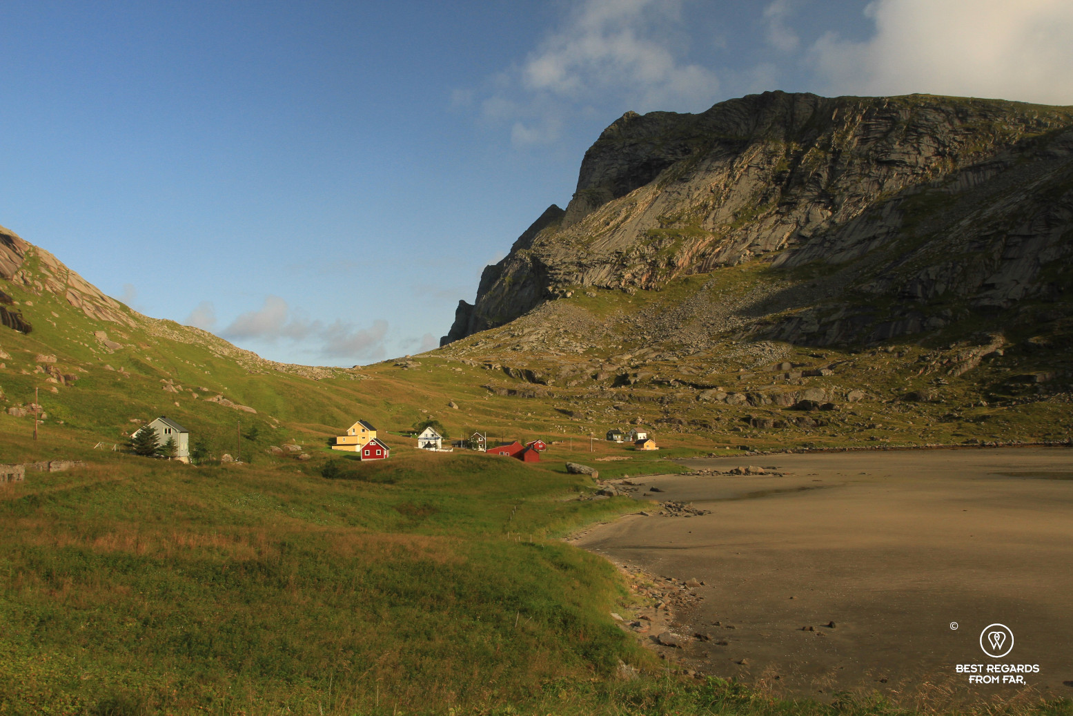 Colourful cabins while hiking to Bunes Beach in Lofoten, Norway