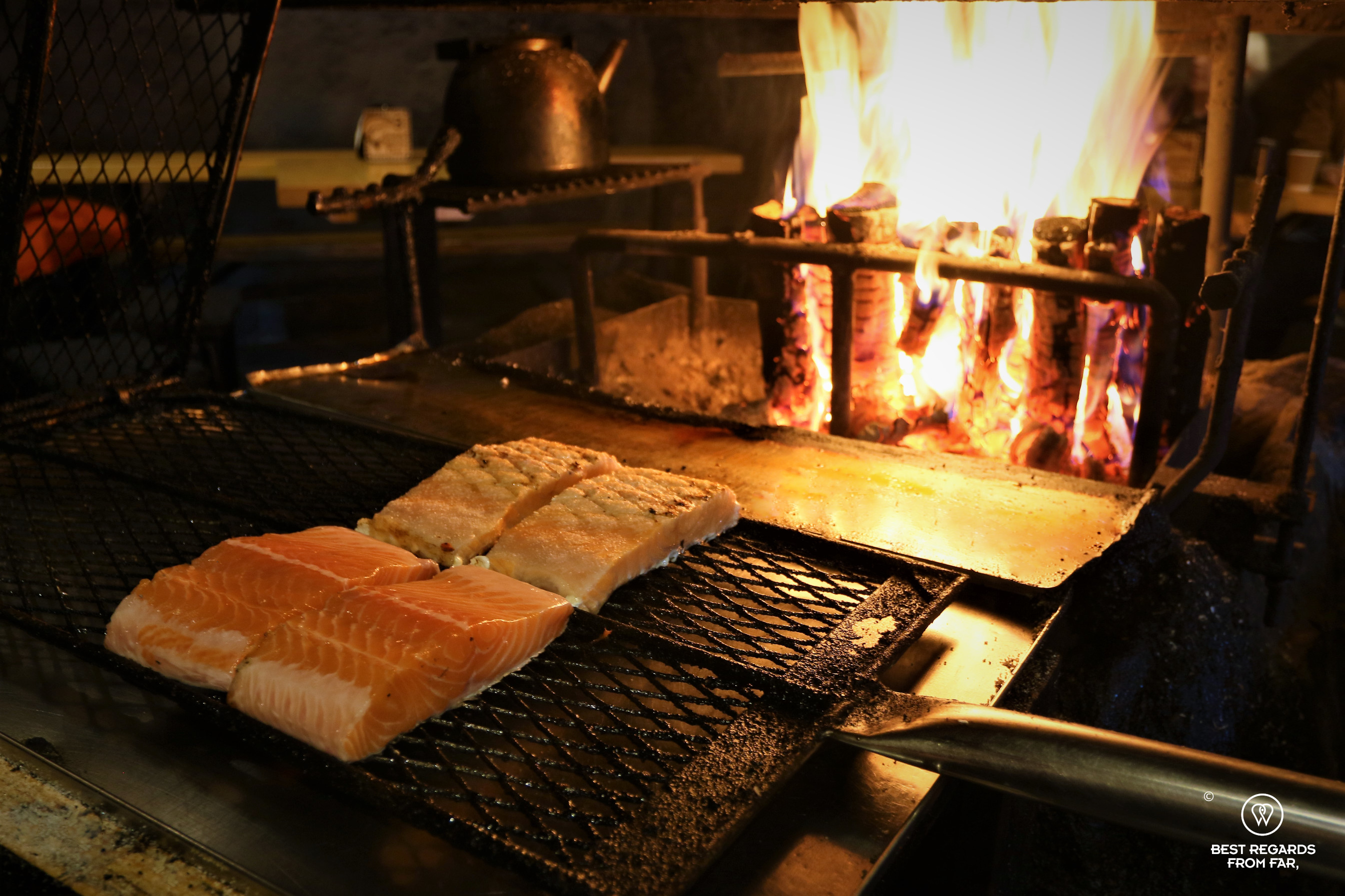 Salmon by the woodfire at Santa's Salmon Place, Rovaniemi, Lapland