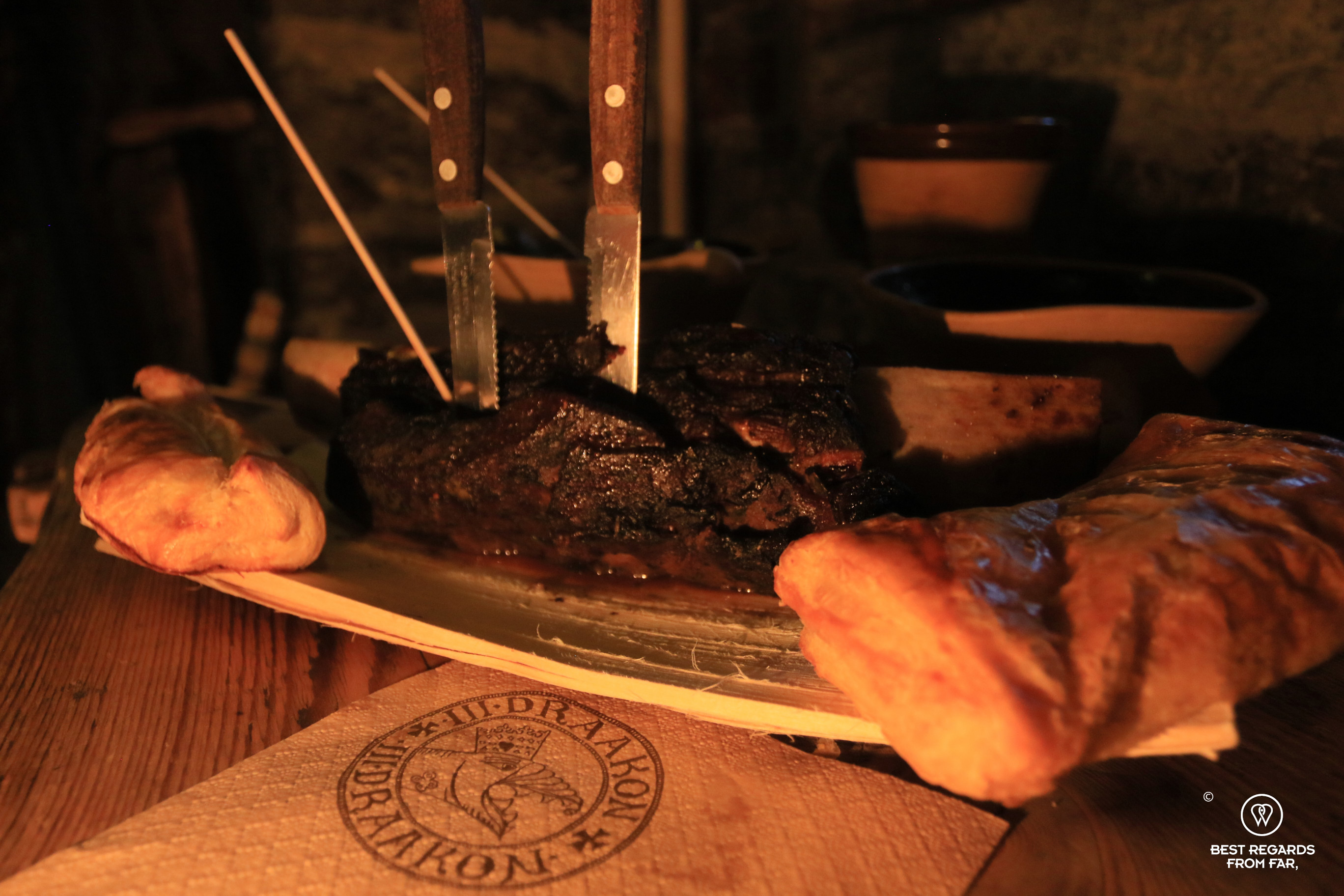 Having food in the III Draakon medieval restaurant, Tallinn