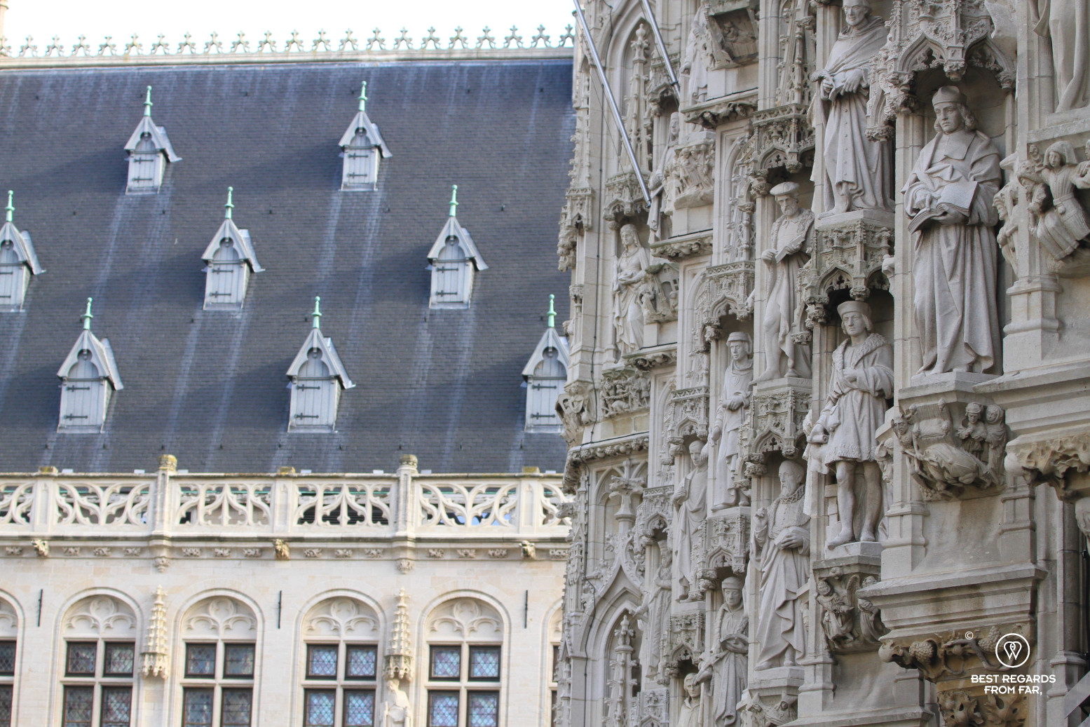 The statues of the City Hall with the Fourth hotel in the background, Leuven, Belgium