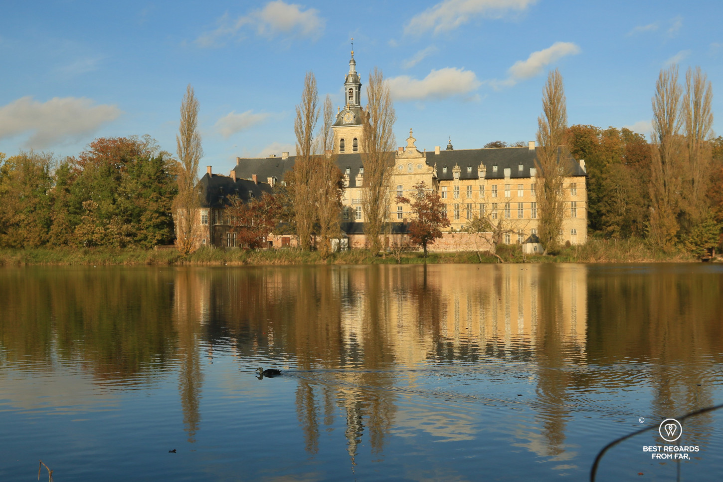 Reflection of Park Abbey in a lake, Leuven, Belgium