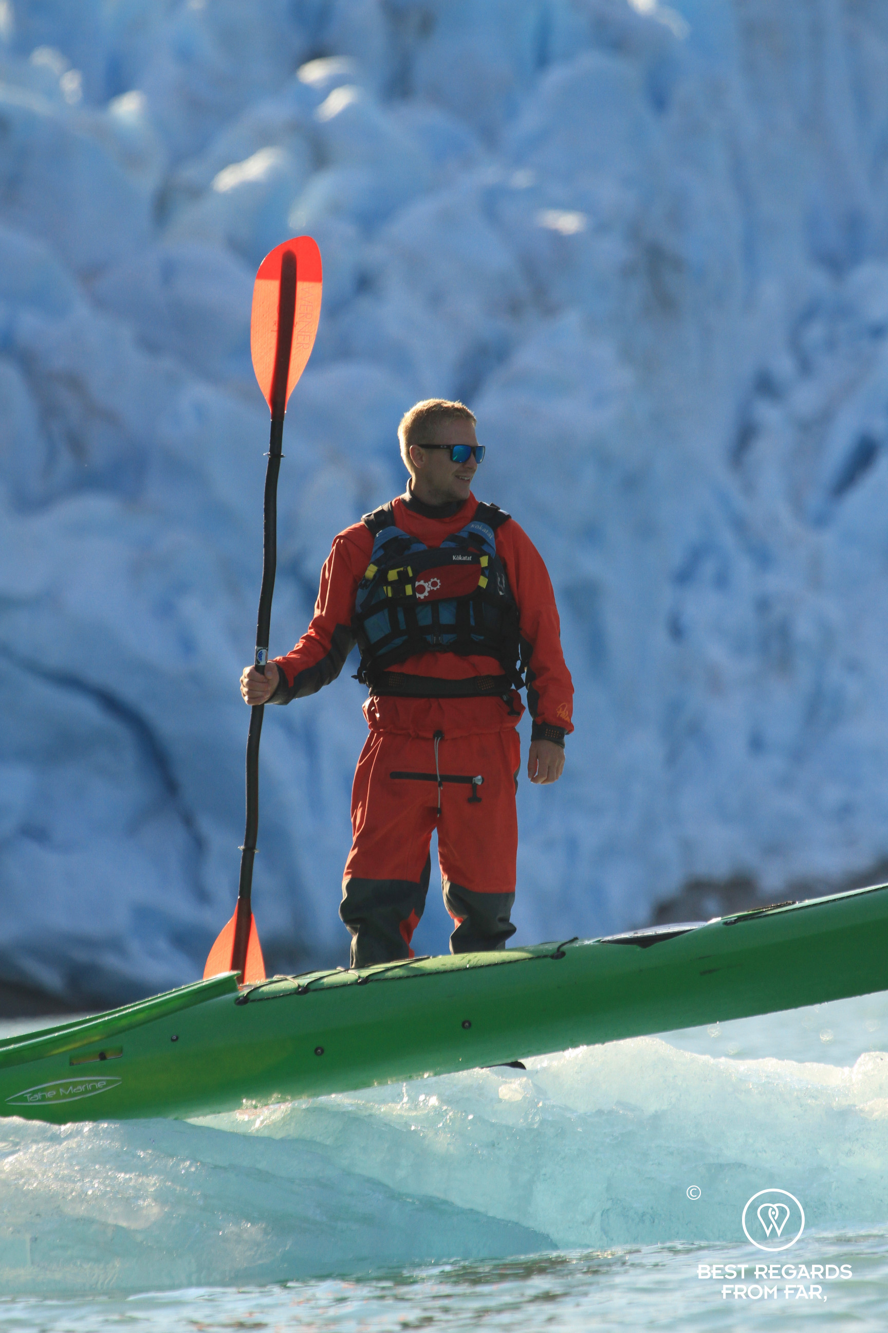 Rune on an iceberg with his kayak