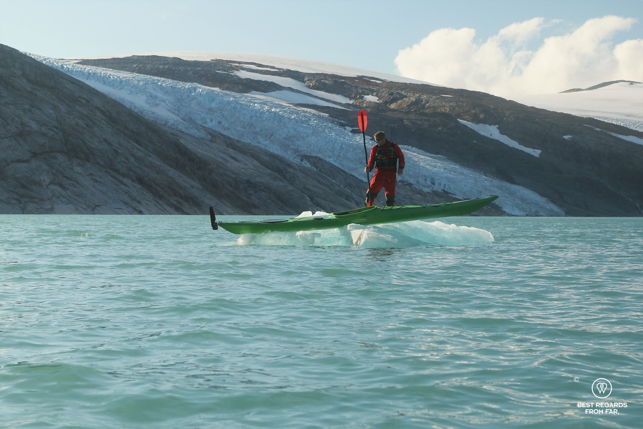 Rune riding an iceberg on the Storglomvatnet Lake