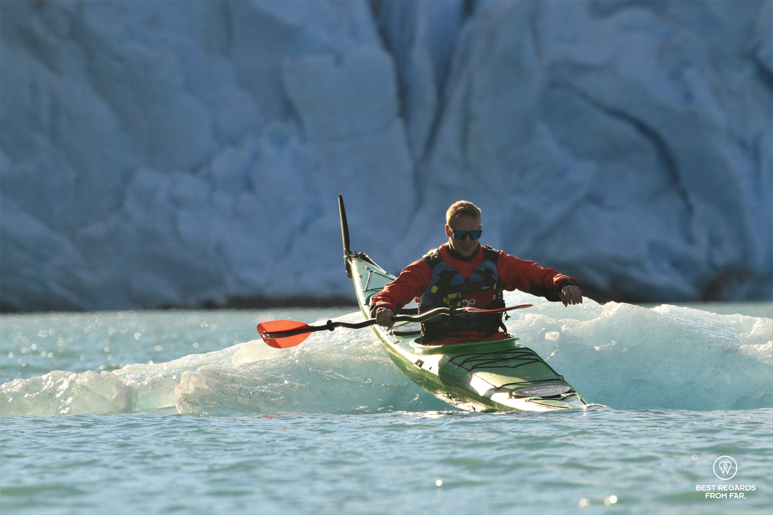 Rune riding an iceberg on the Storglomvatnet Lake
