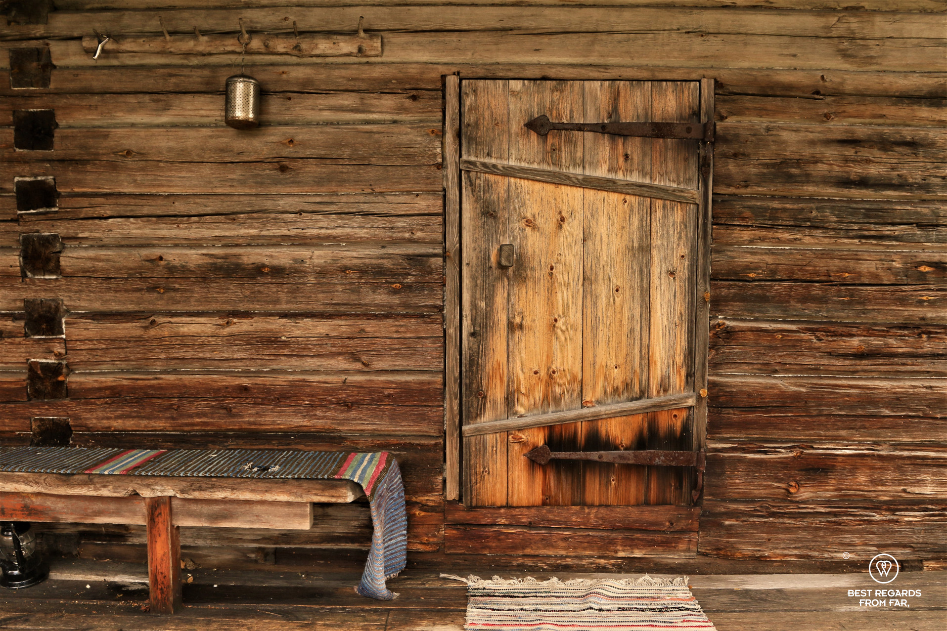 Wooden door of the Kumpunen Smoke Sauna, Finland