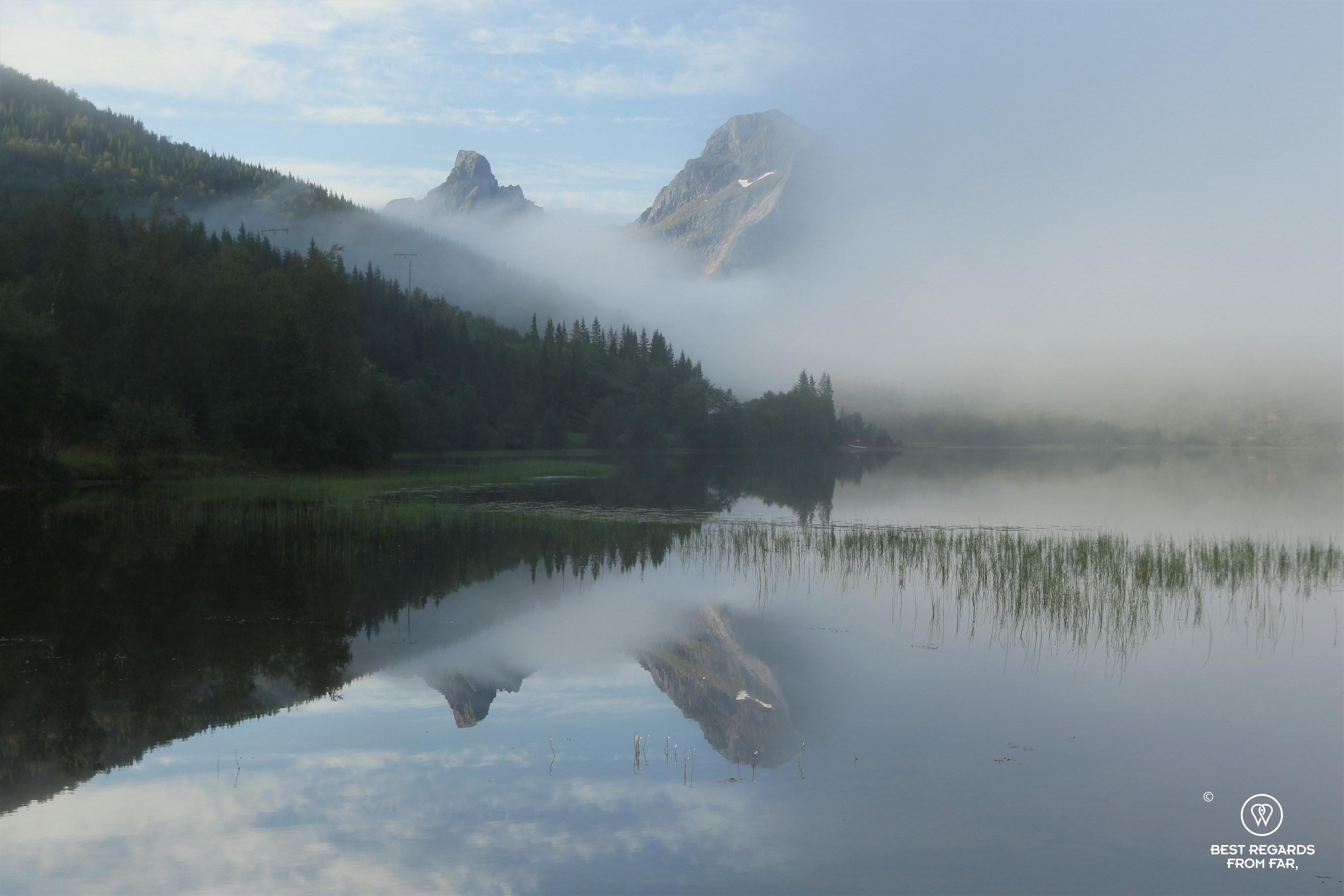 Reflection in a fjord along the Coastal Road, Norway