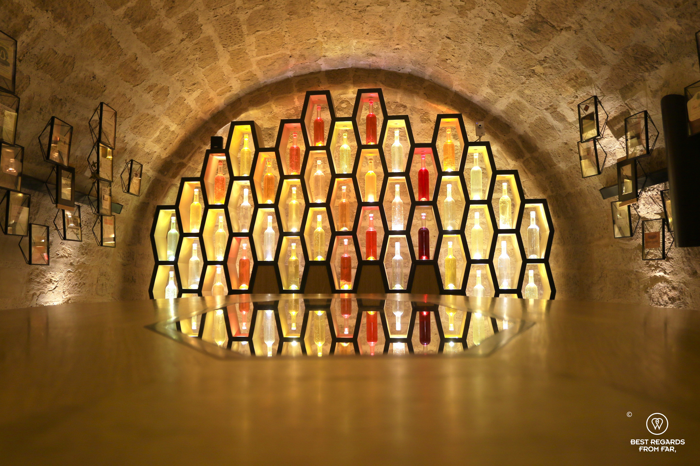 Back lit bottles at Les Caves du Louvre, Paris