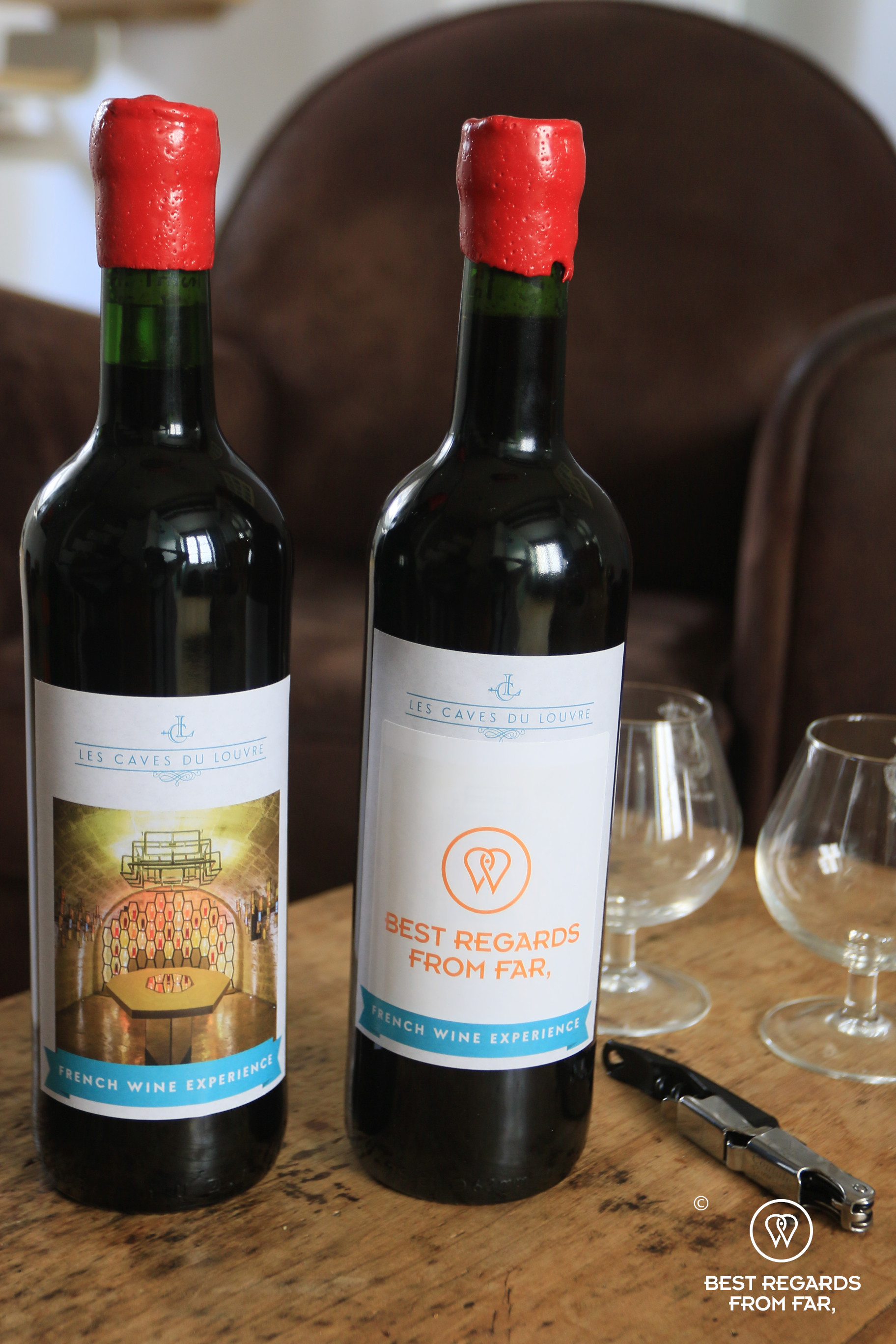 Two bottles of wines with custom stickers following the winemaking workshop