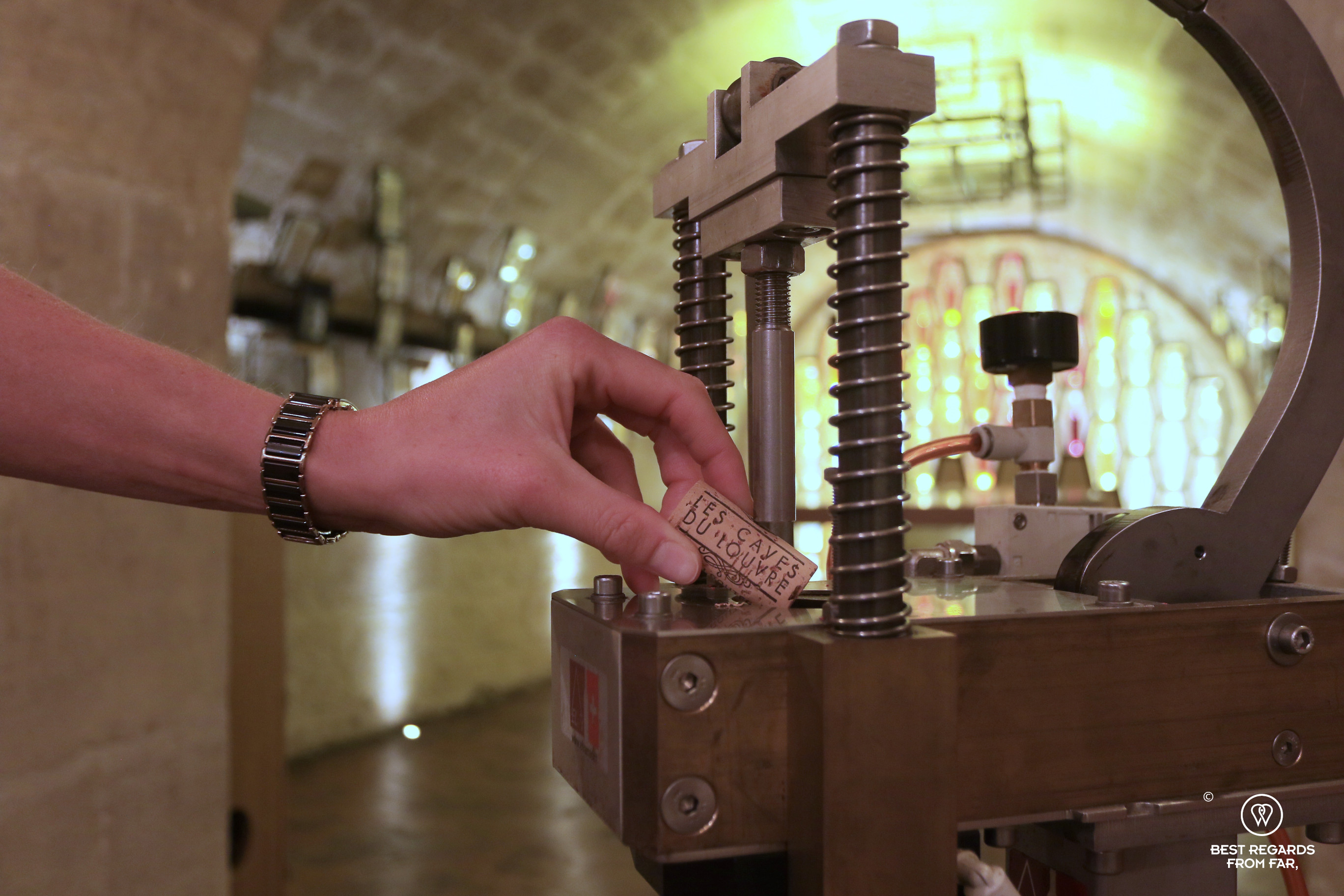 Corking the bottle at the end of the winemaking workshop