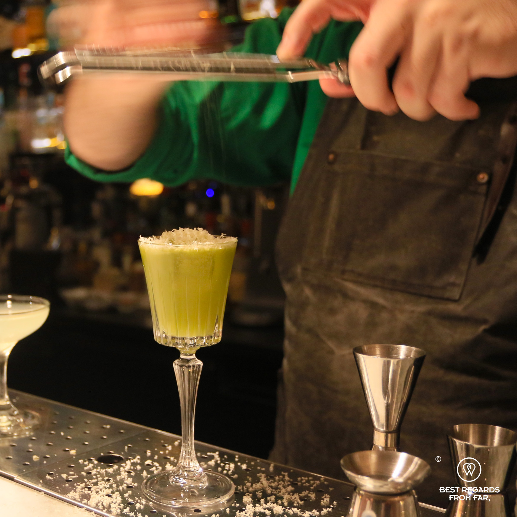 Mixing a 7 Lucky Gods at Whisper Sister speakeasy bar, Tallinn