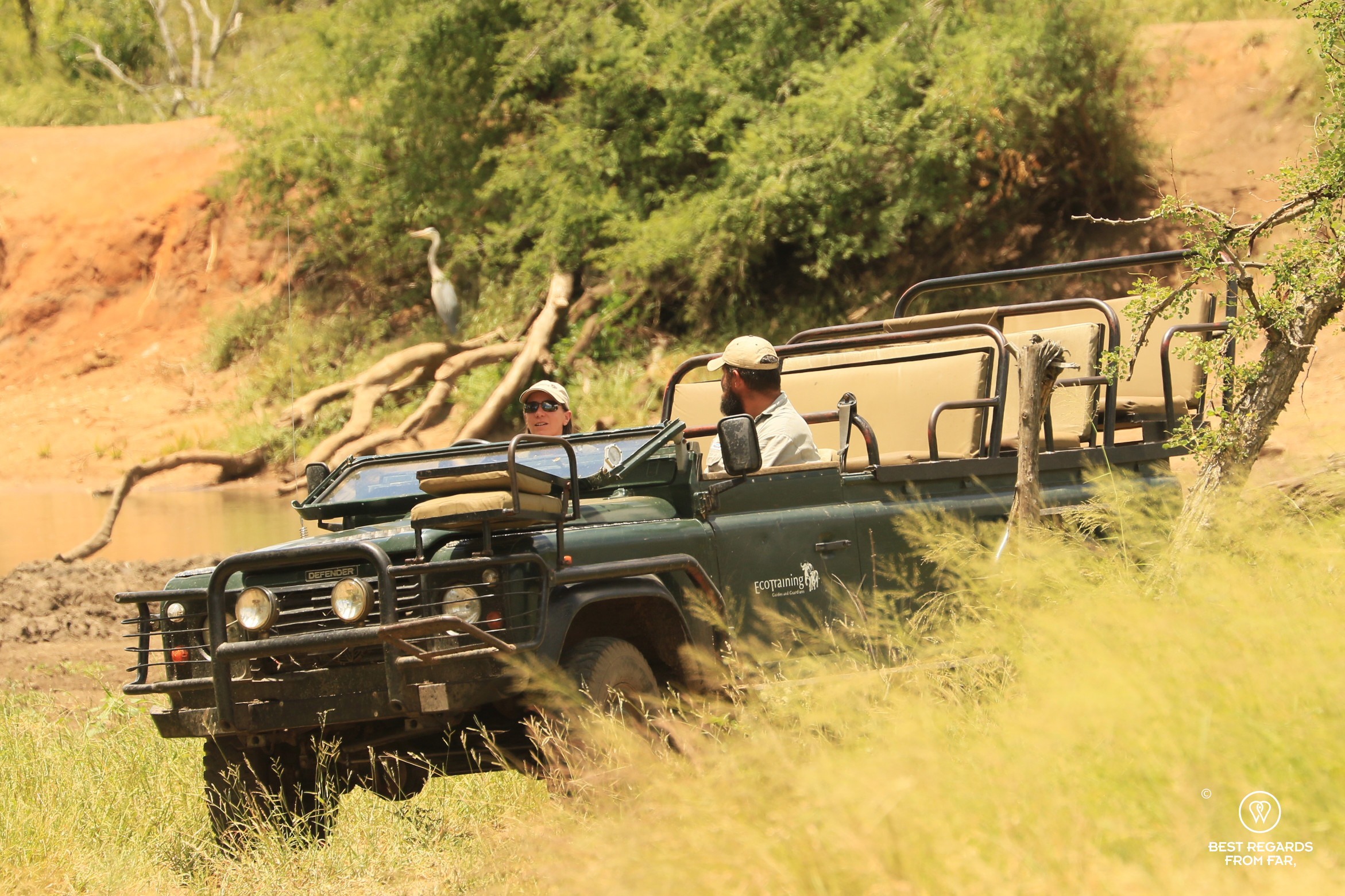 Photographer Claire Lessiau driving 4x4 on field guide training