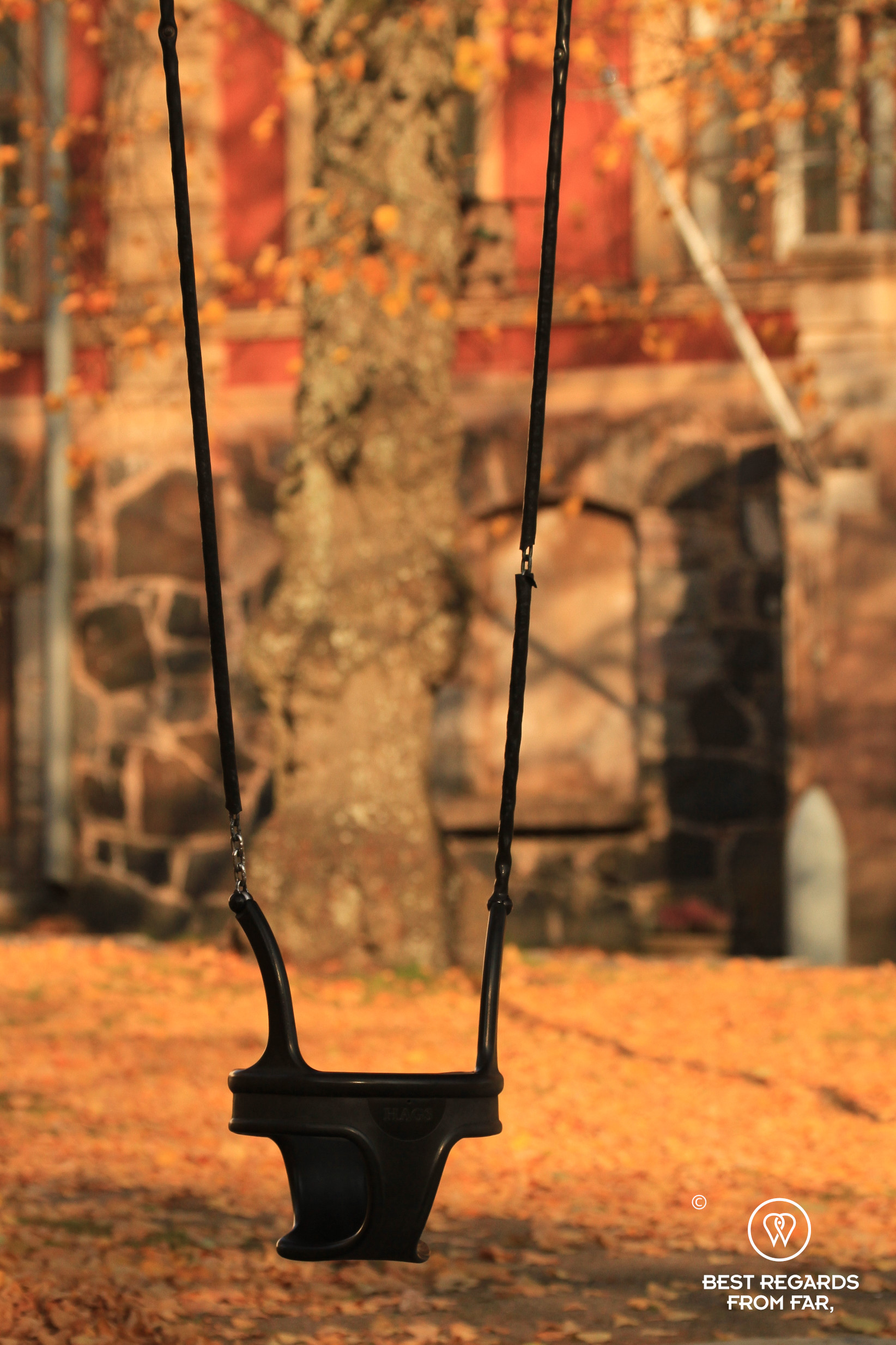 Swing with autumn colours at the Suomenlinna Sea Fortress, Helsinki