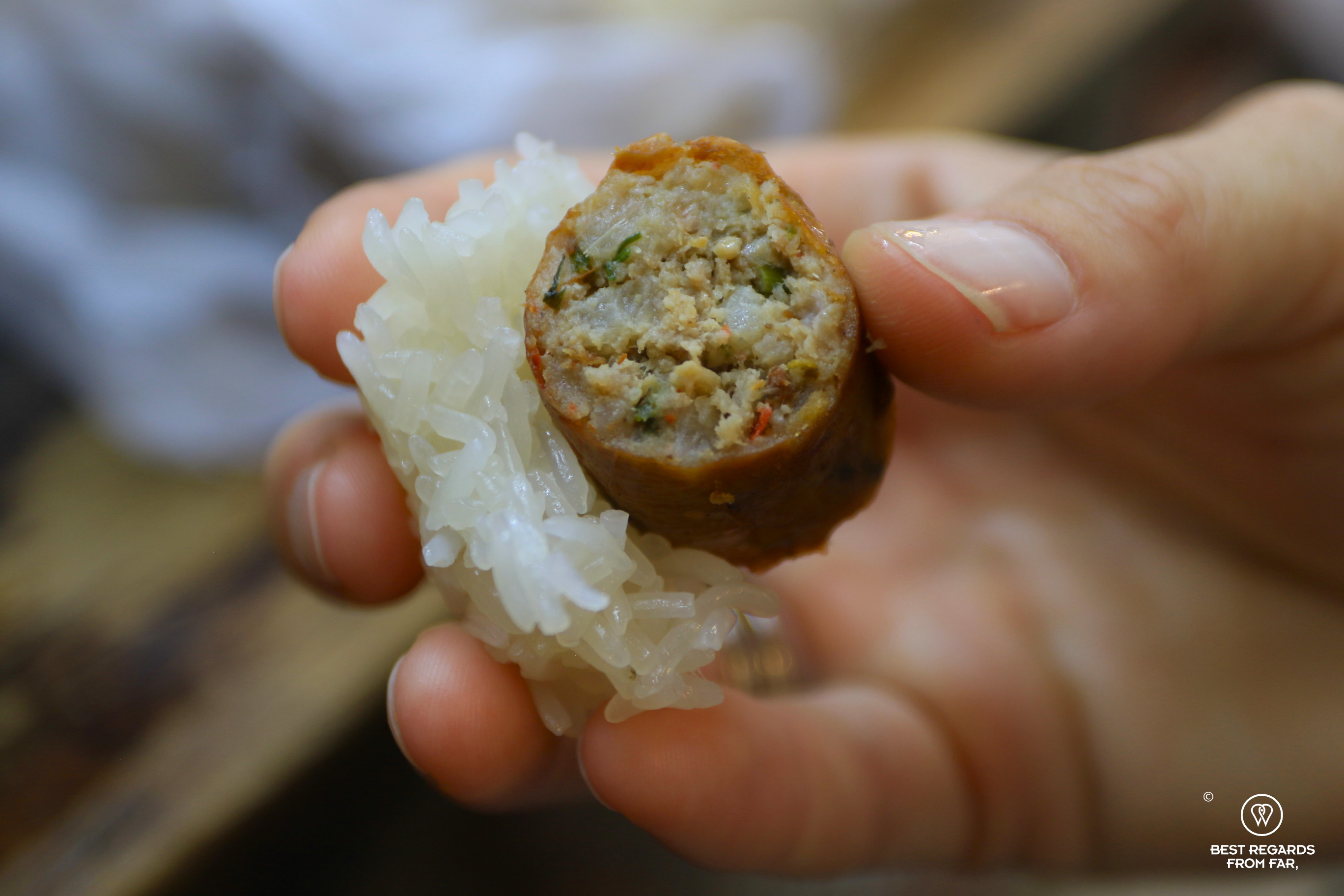 Sai Ua or Chiang Mai sausage eaten with sticky rice, Thailand