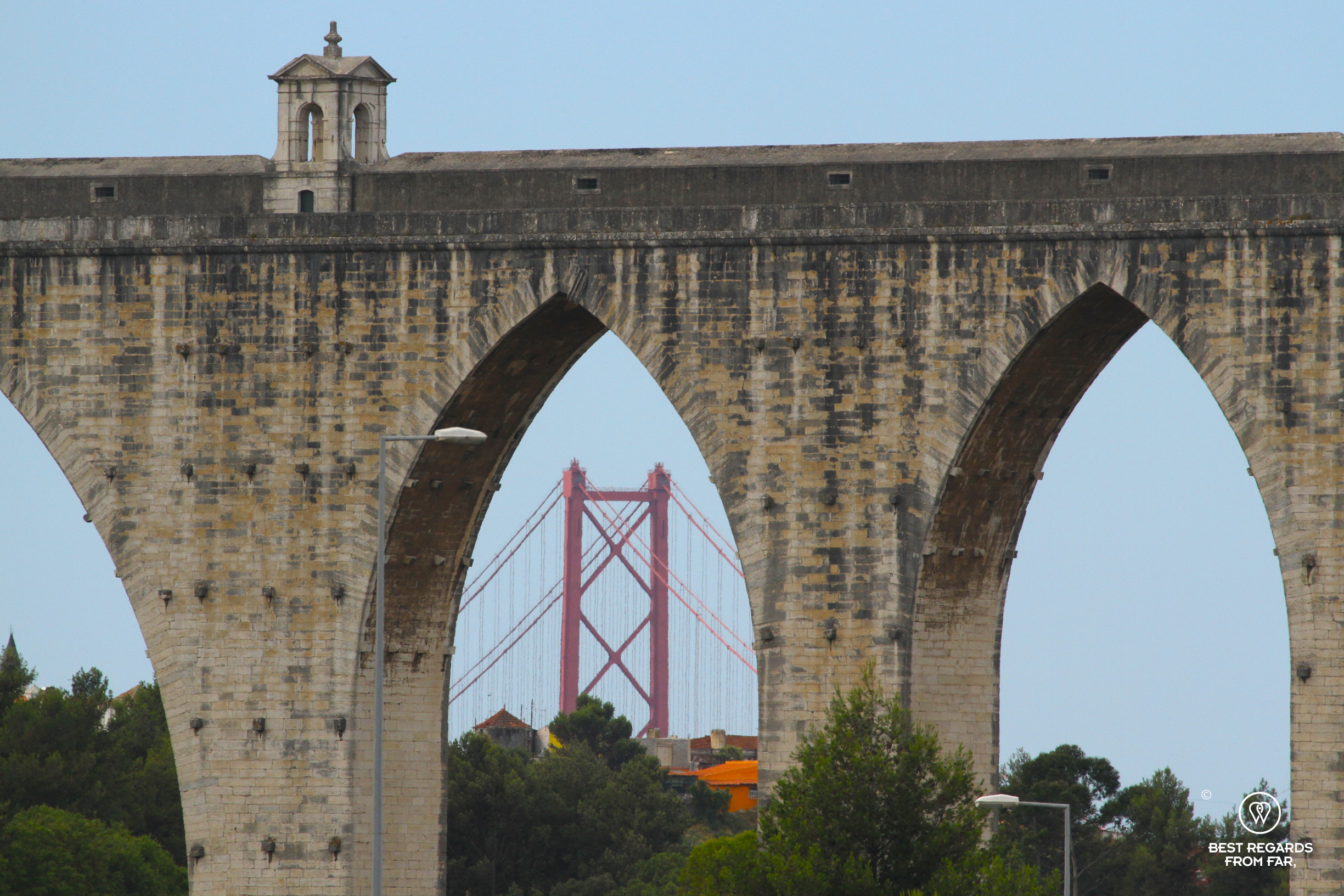 Roman aqueduct and the modern Ponte 25 de Abril bridge, Lisbon