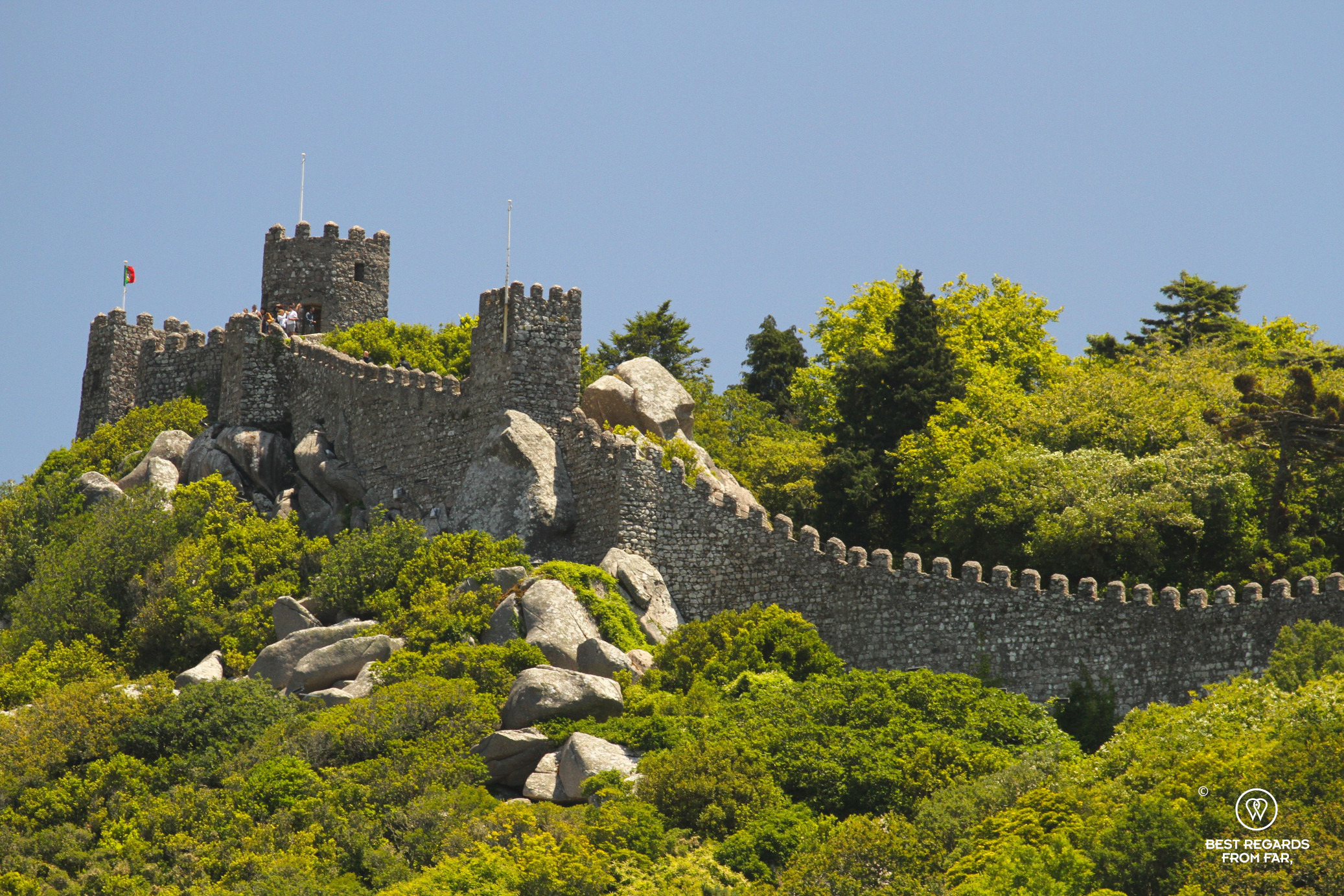 Hill with a castle wall and blue skies in Portugal