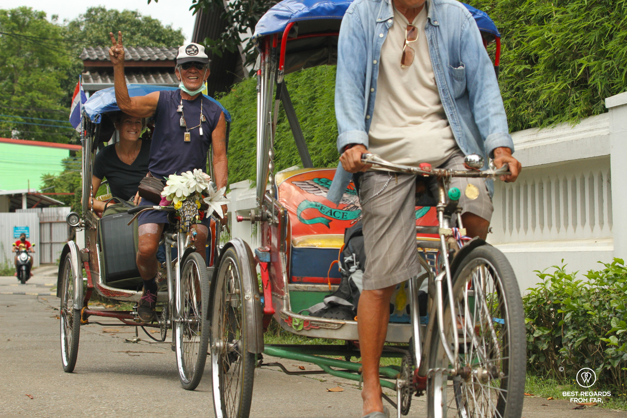 Enthusiastic samlor driver in the streets of Chiang Mai