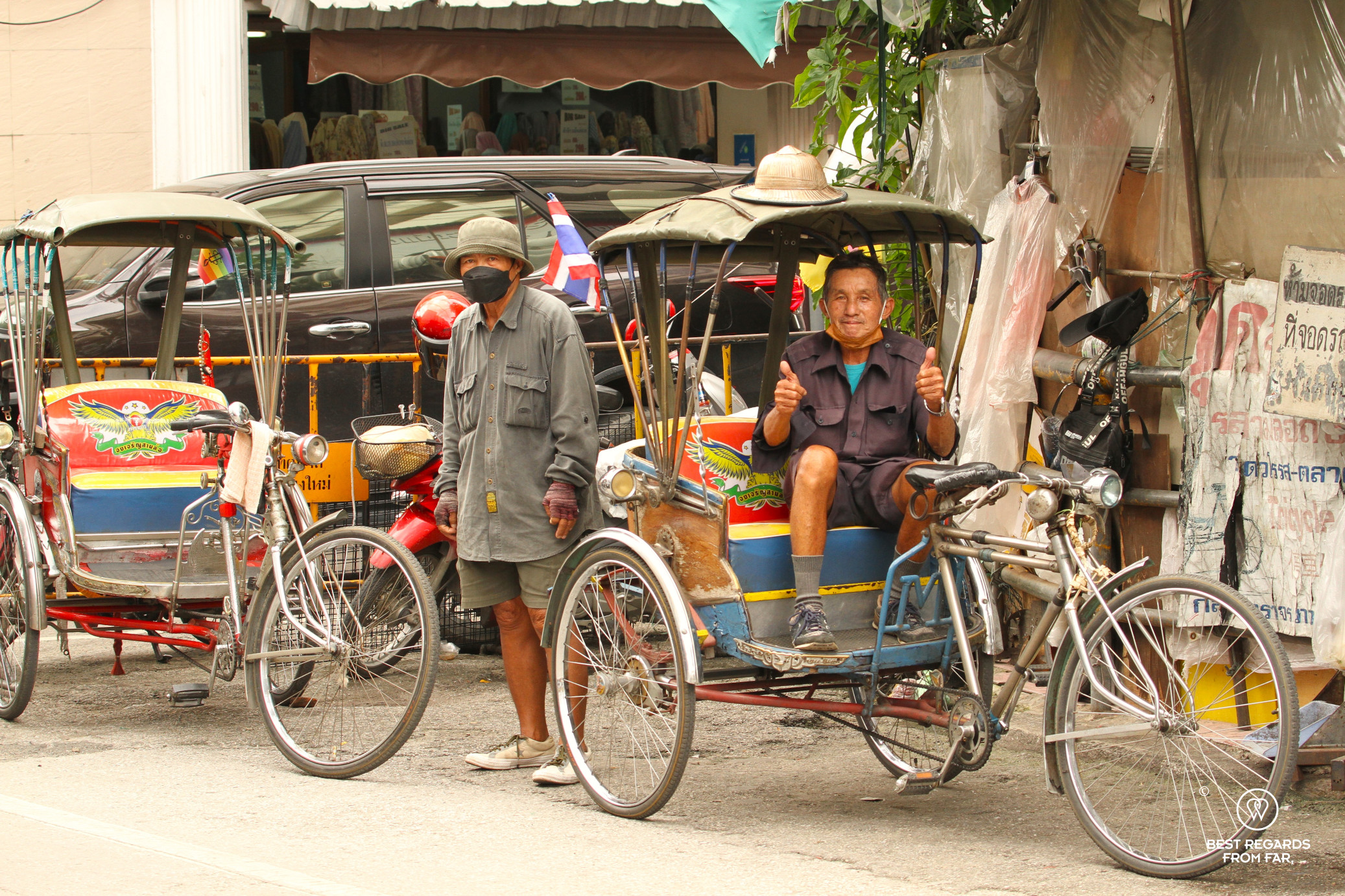 Samlor drivers by the market in Chiang Mai, Thailand