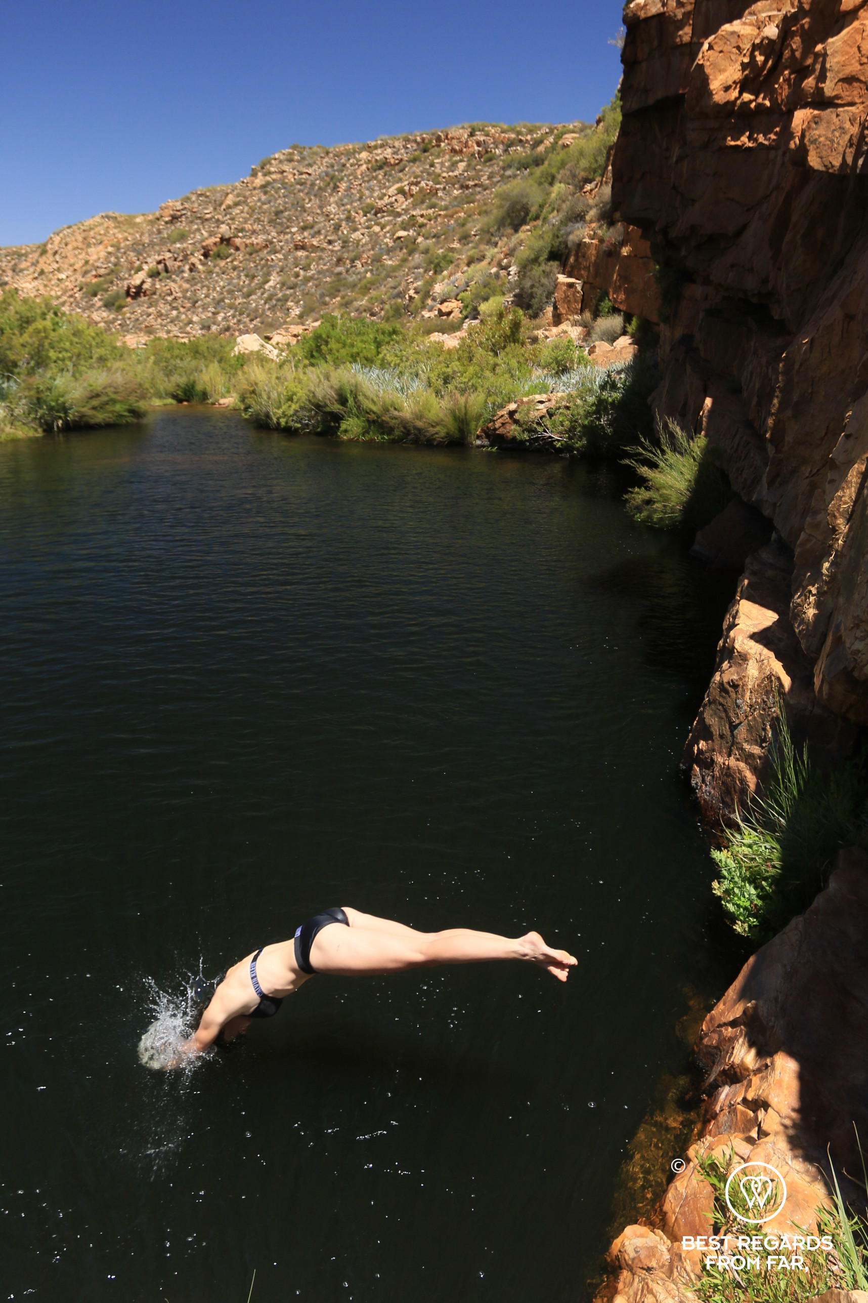 Diving into the Maalgat swimming hole, Cederberg, South Africa