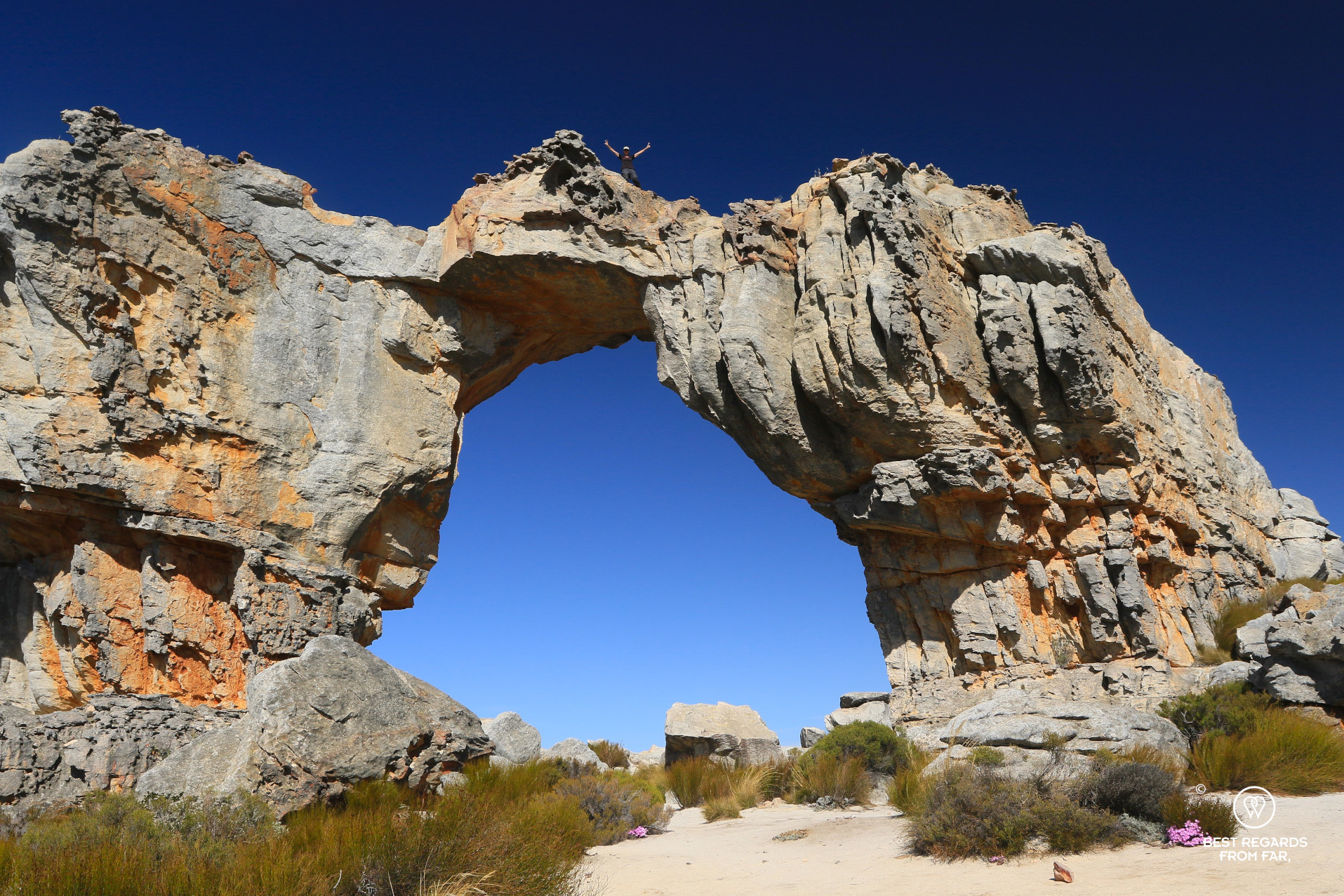 Hiker topping the Wolfberg Arch, Cederberg, South Africa