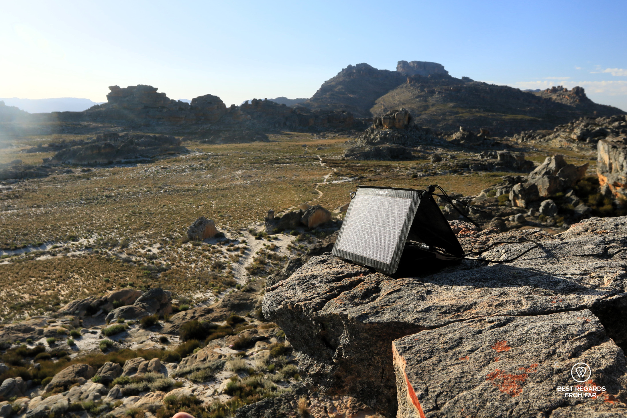 The semi-arid wild ladscape by the Wolfberg Arch, Cederberg with a solar panel in the foreground.