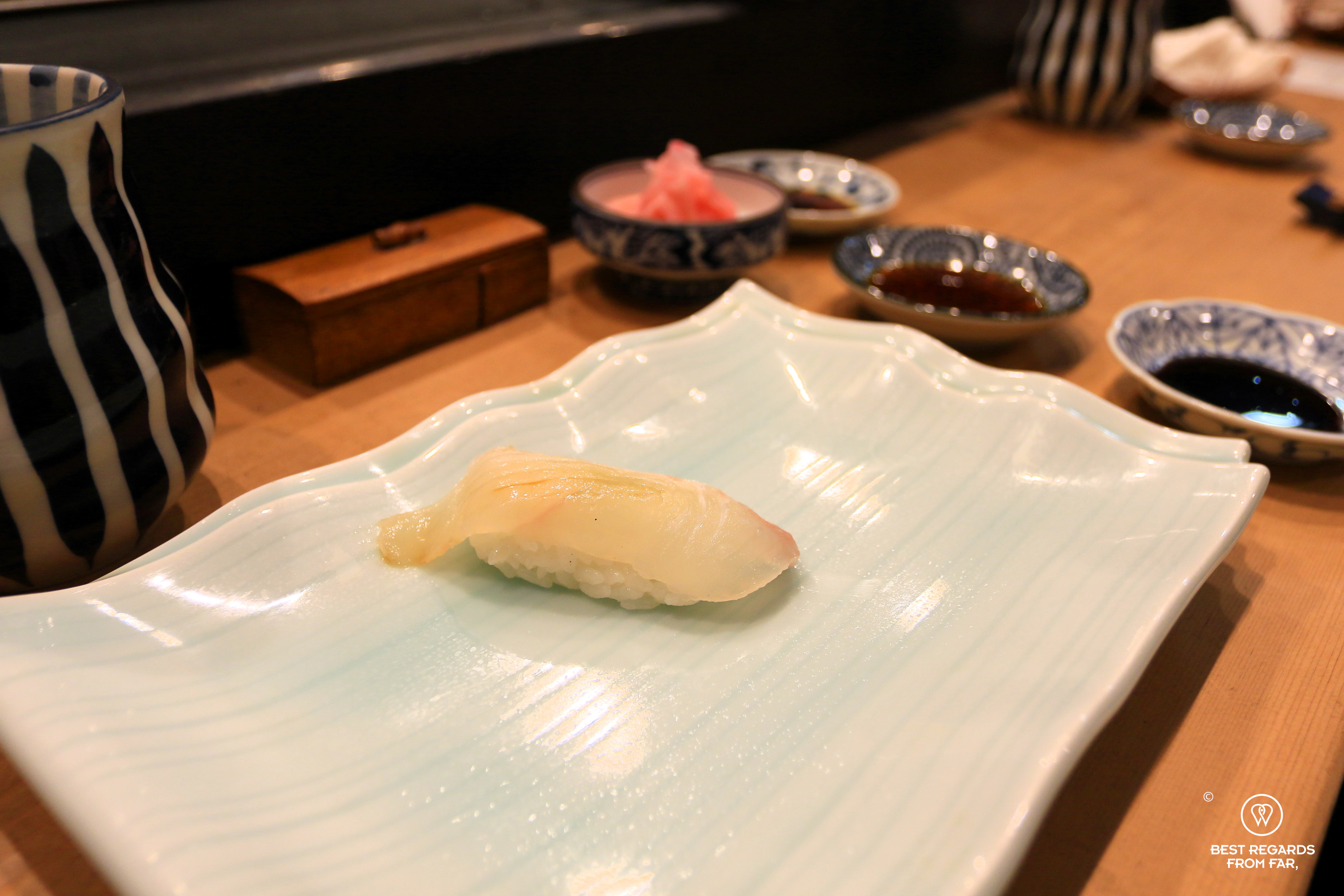 Bastard halibut (hirame) in sushiya