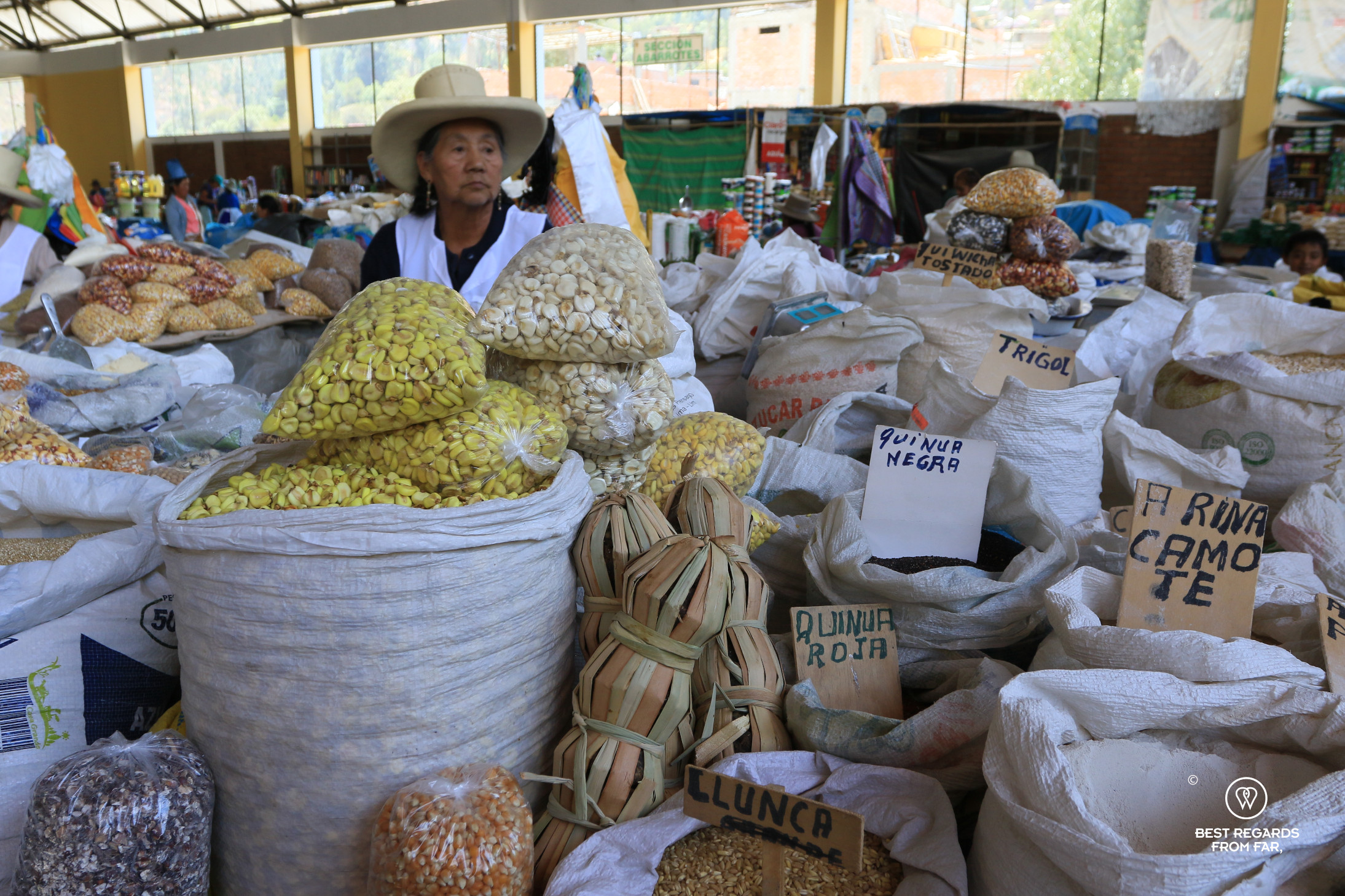 Woman selling local products at the Sunday market in Carhuaz, Peru