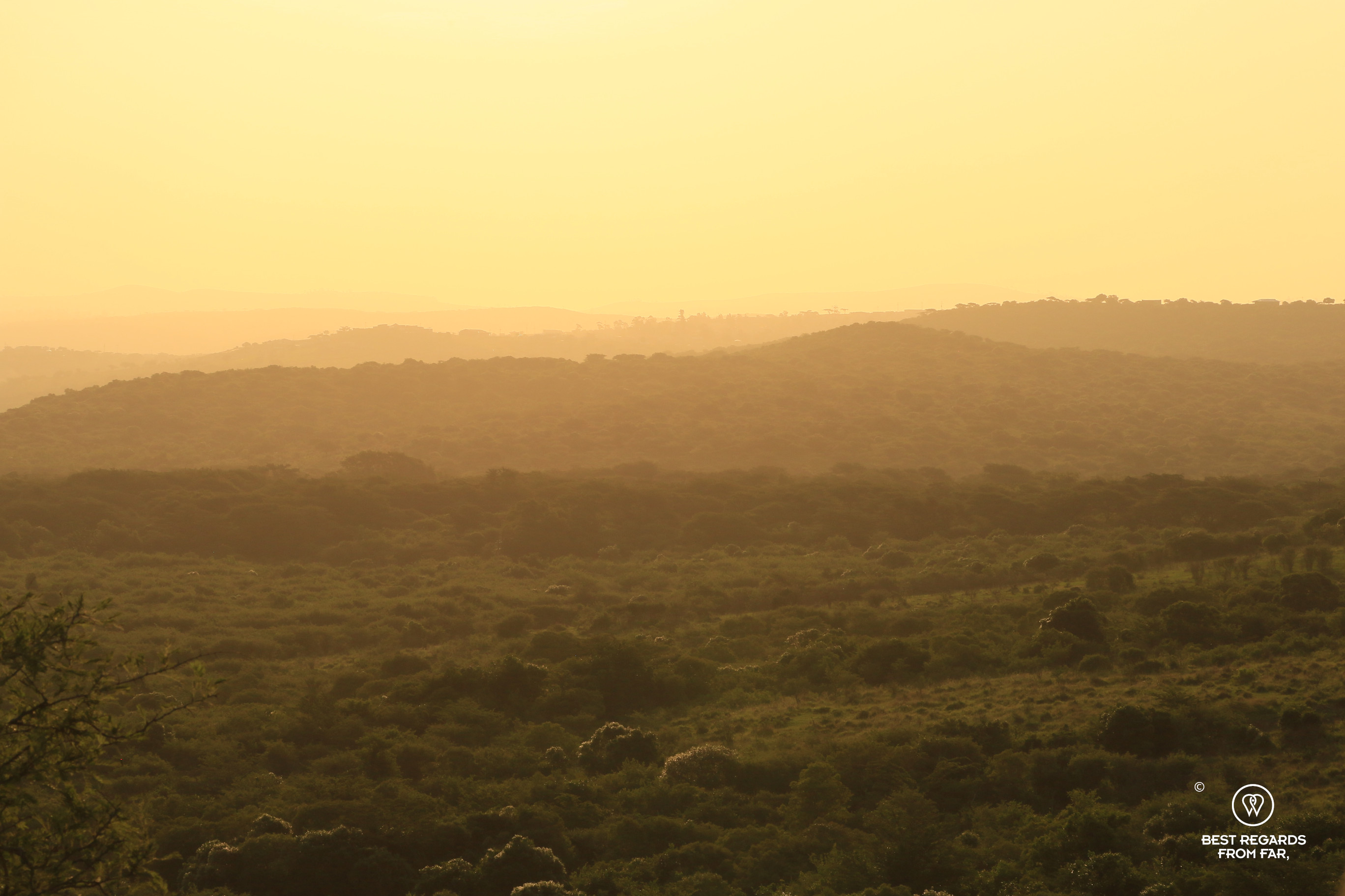 Sunset over the rolling hills of the Thula Thula Game Reserve, South Africa