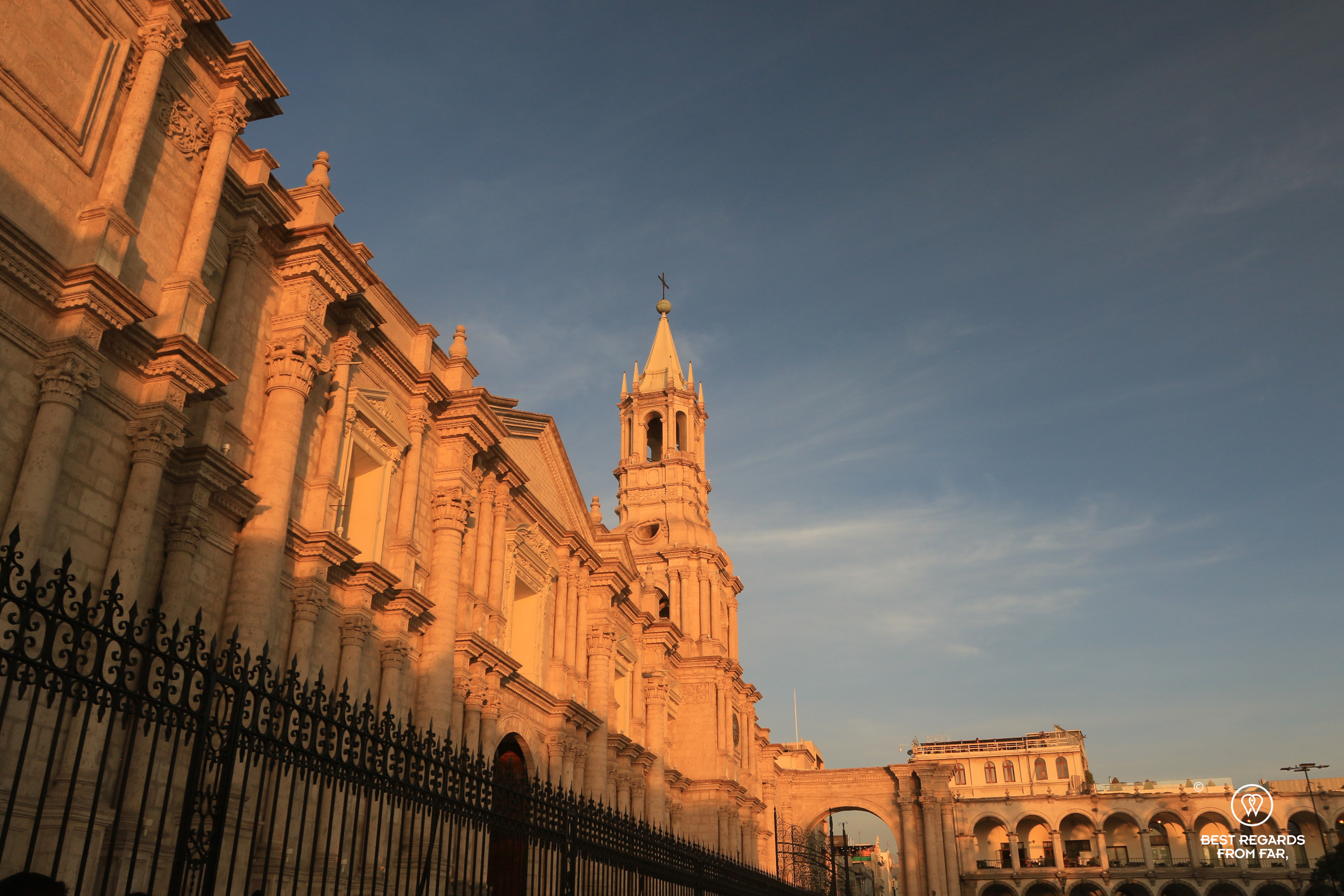White sillar Cathedral of Arequipa bathed in a warm sunset light