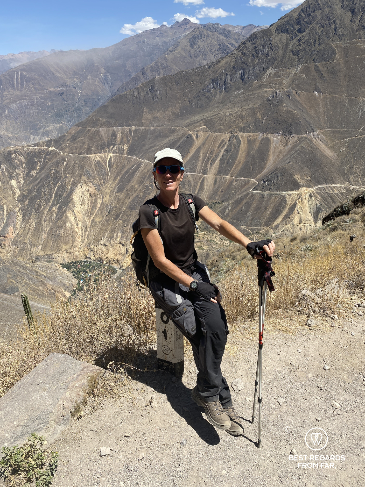Author Claire Lessiau by Trail Marker 1 in the Colca Canyon