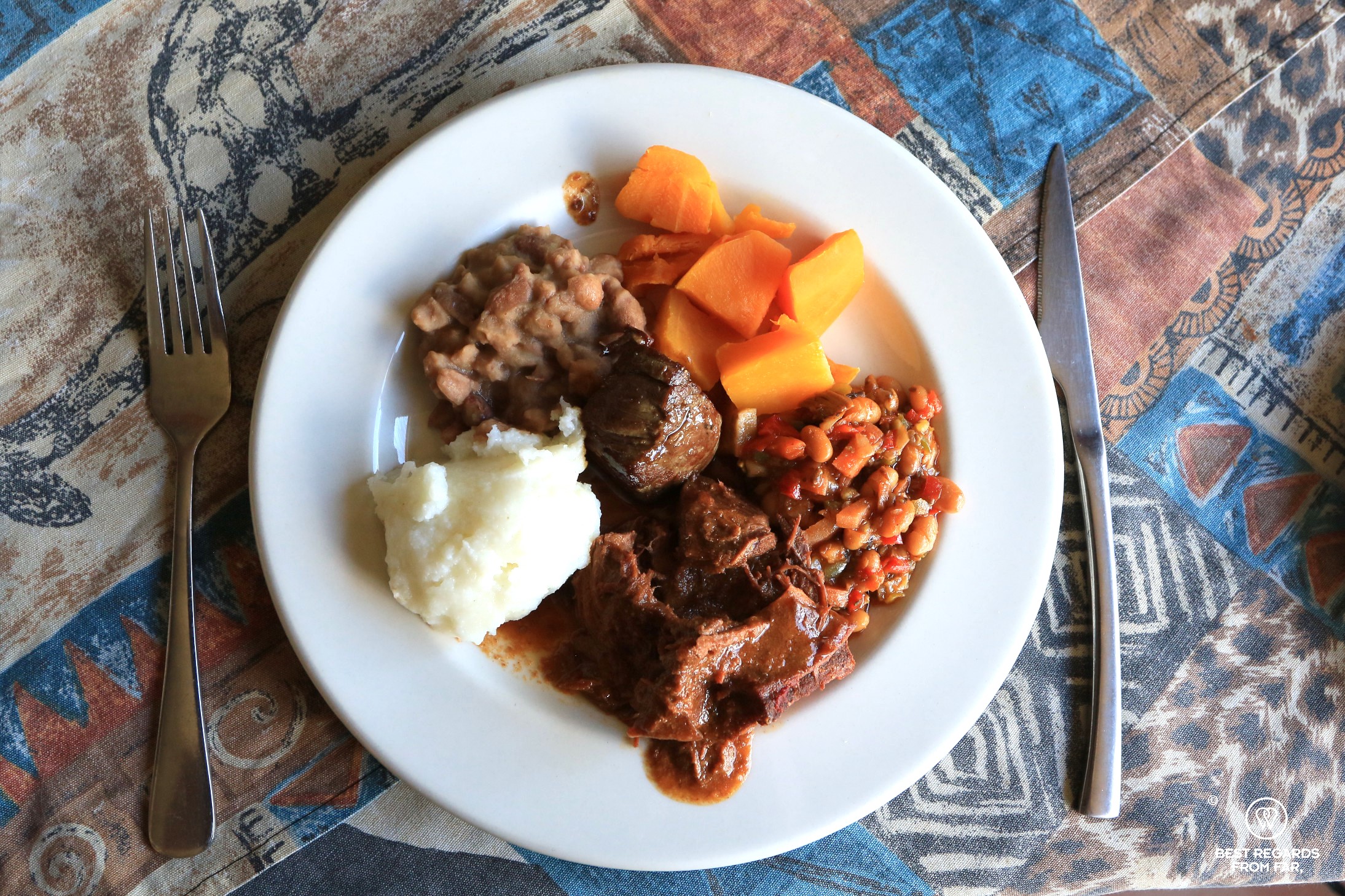 African game meat with traditional staple food at Marco's African Place