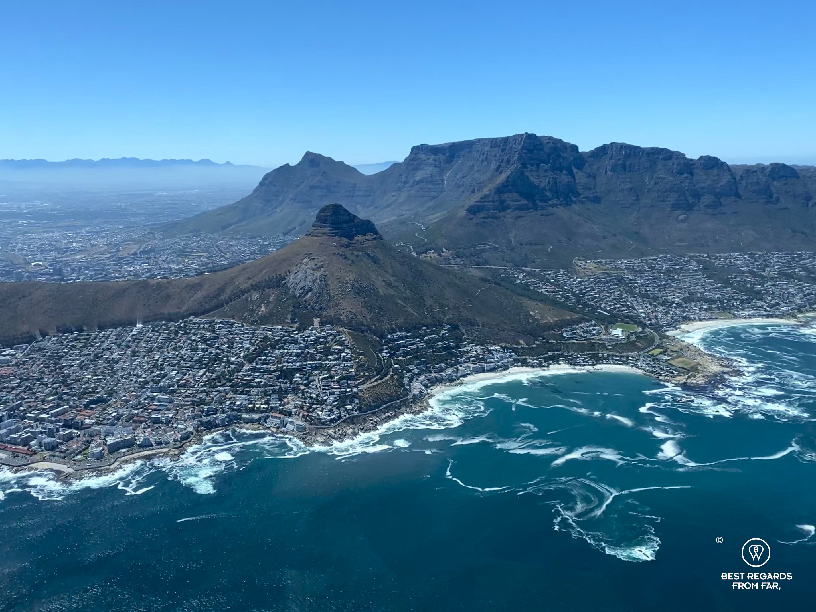 Helicopter view on Sea Point, Clifton, Lion's Head, Table Mountain and Devil's peak on a sunny day