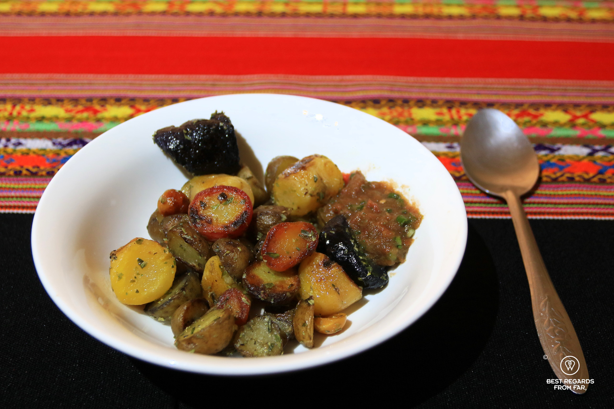 Huayco papas, a plate of colorful and varied potatoes.