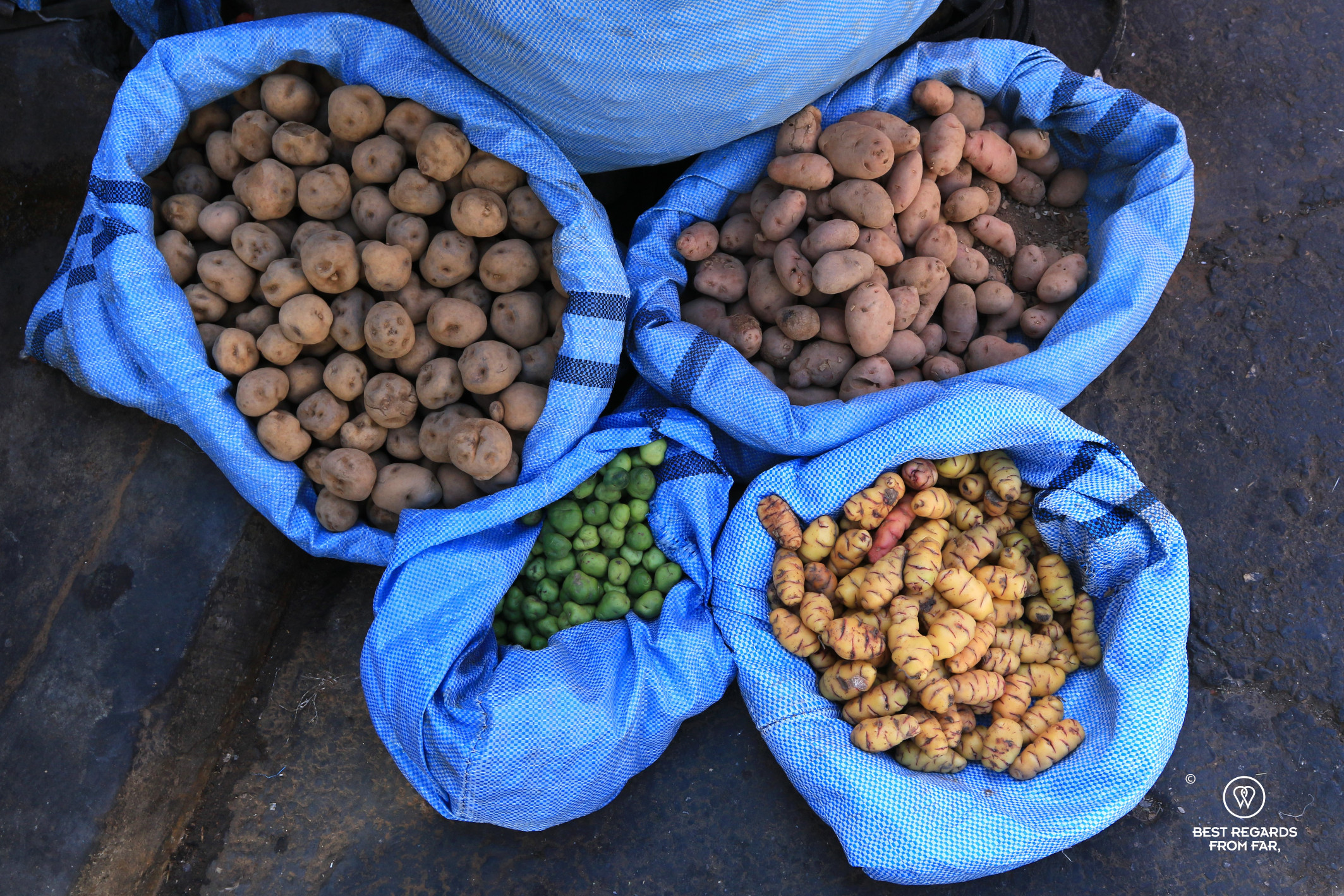 Different colorful varieties of potatoes in the street at the Mercado Campesino of Sucre, Bolivia.