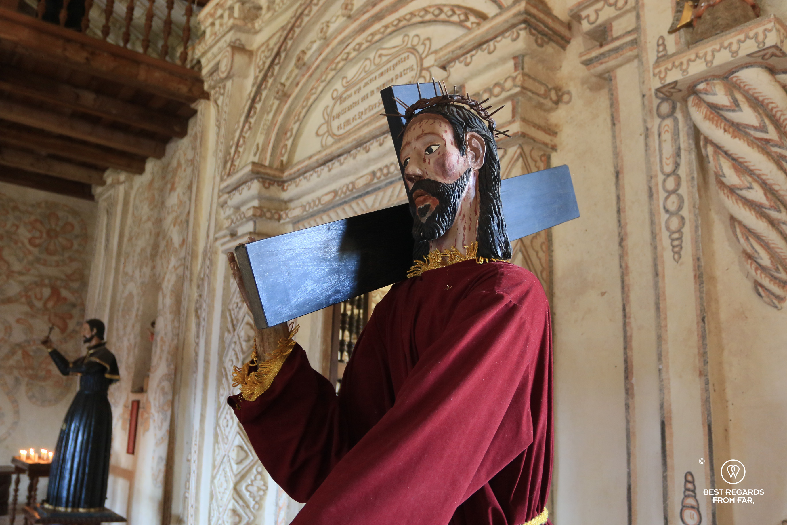 Wood sculptures inside the San Xavier Jesuit mission church.