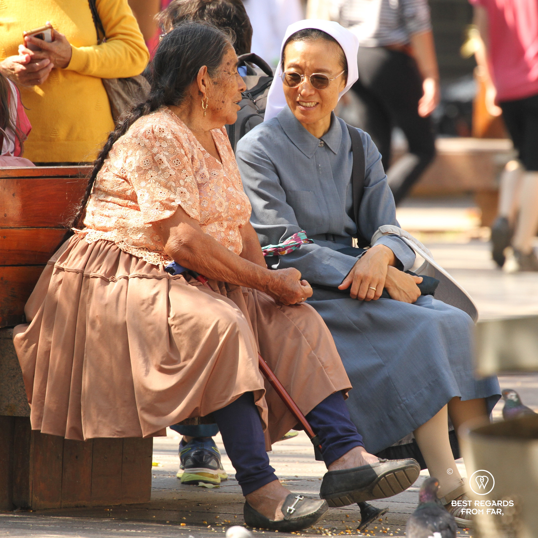 Nun talking to an indigenous women on the main square of Santa Cruz de la Sierra.