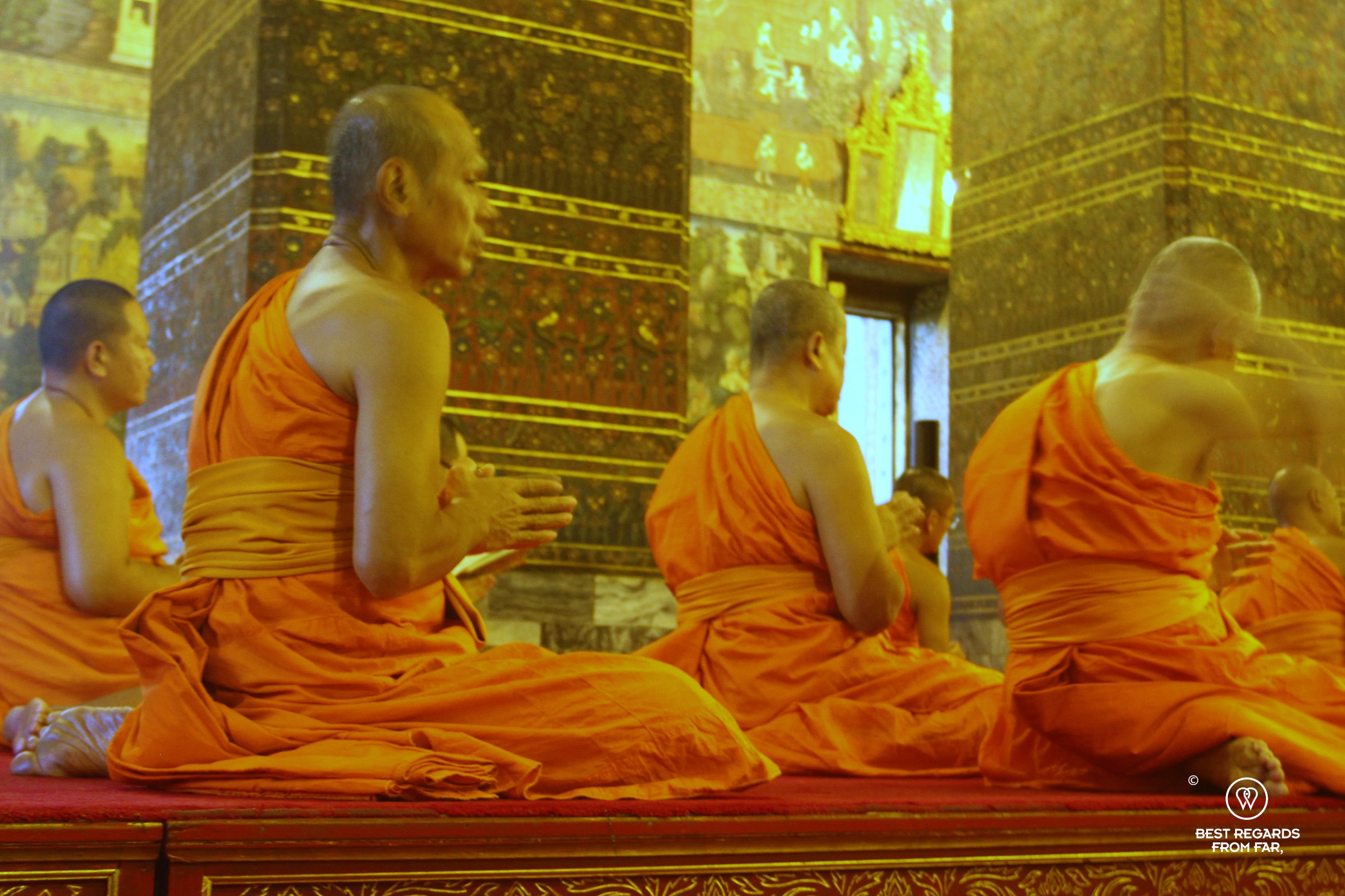 Buddhist monks praying.
