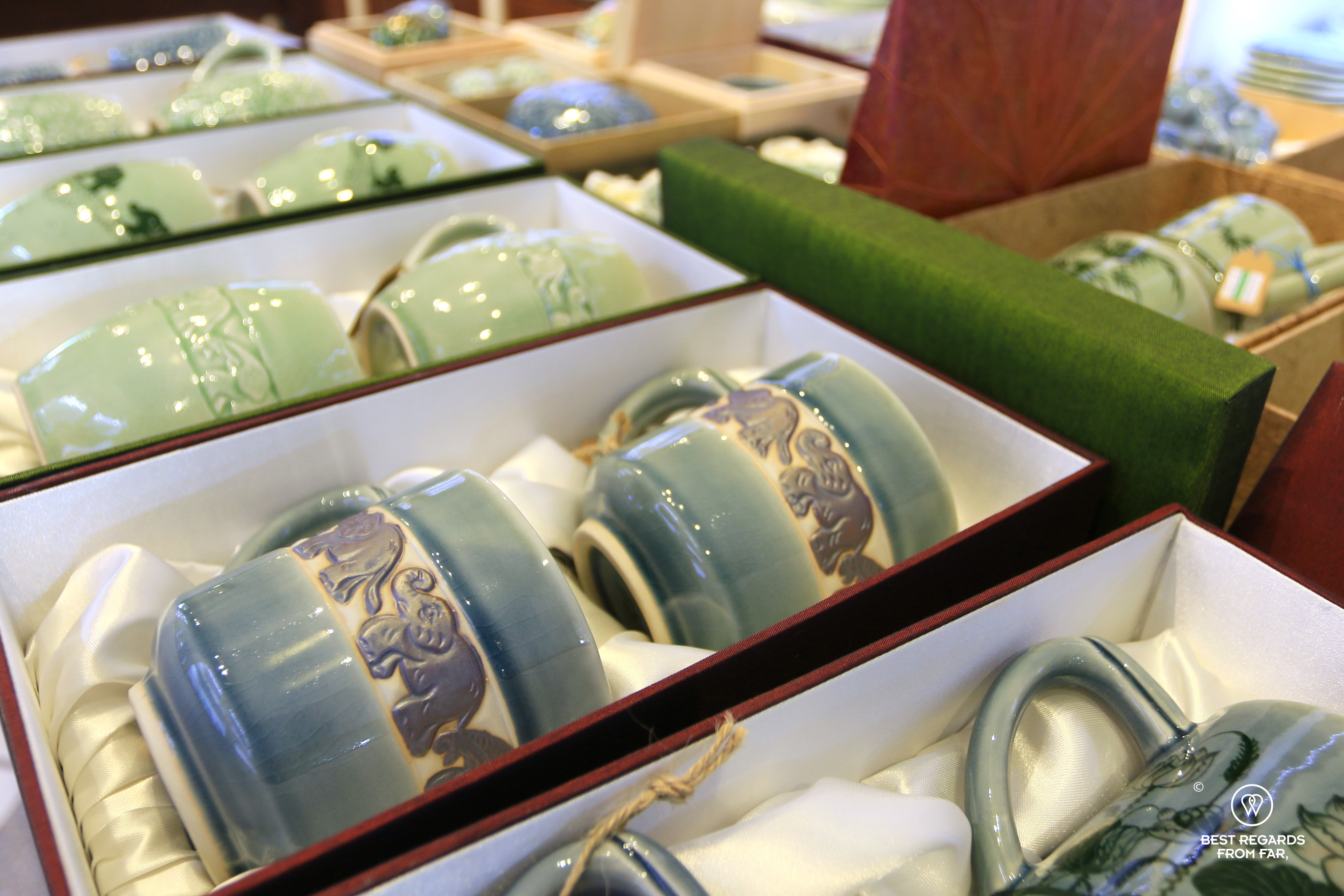 Celadon mugs in a shop.