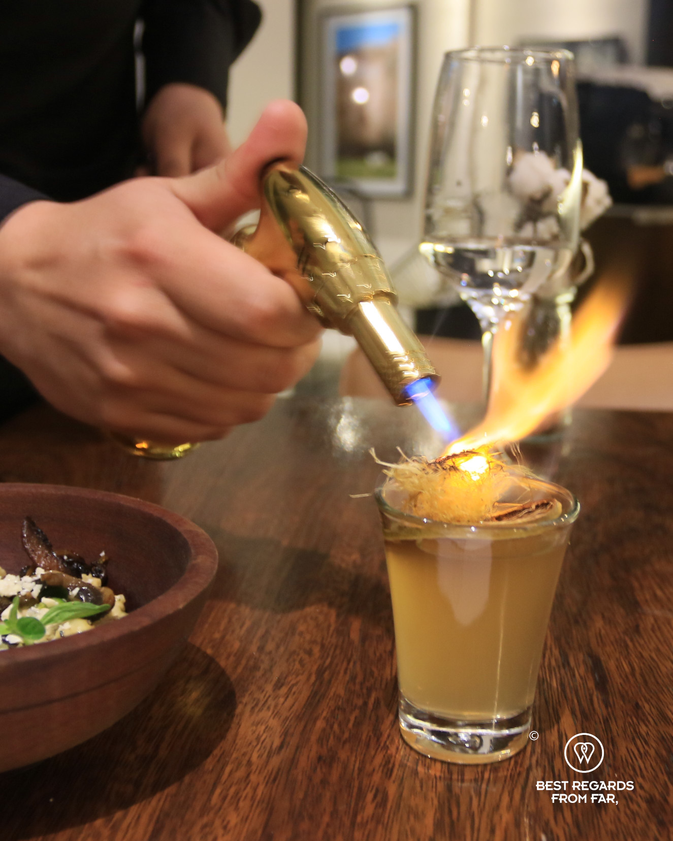 Cocktail being flamed at Proyecto Nativa restaurant.